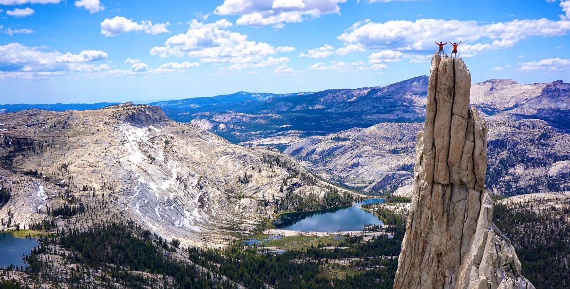 Eichorn Pinnacle with rejoicing rock climbers above Yosemite Valley at Yosemite National Park in California, picture