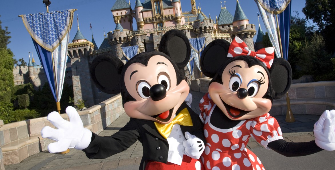 Mickey and Minnie in front of Cinderella's Castle in Disneyland, image
