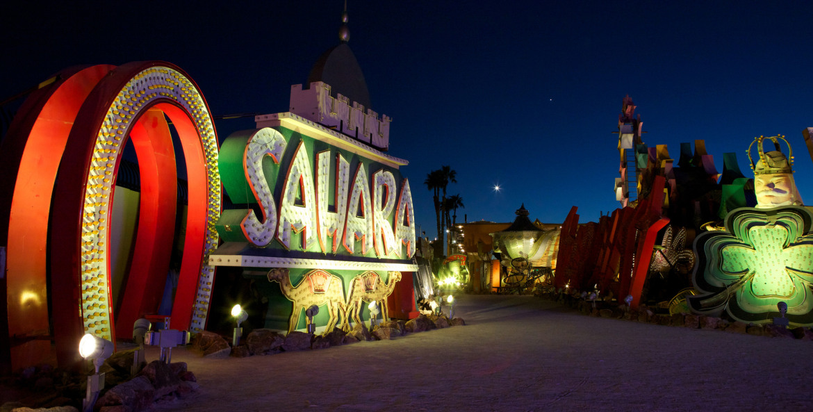 a retro Sahara sign at the Neon Museum in Las Vegas lit up at night, picture
