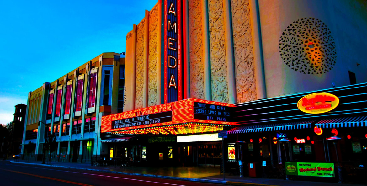 Alameda Theatre & Cineplex lit up at night