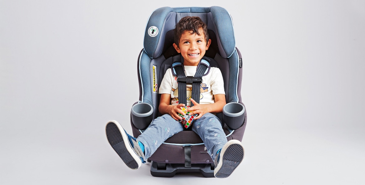 child seated in car seat, photo