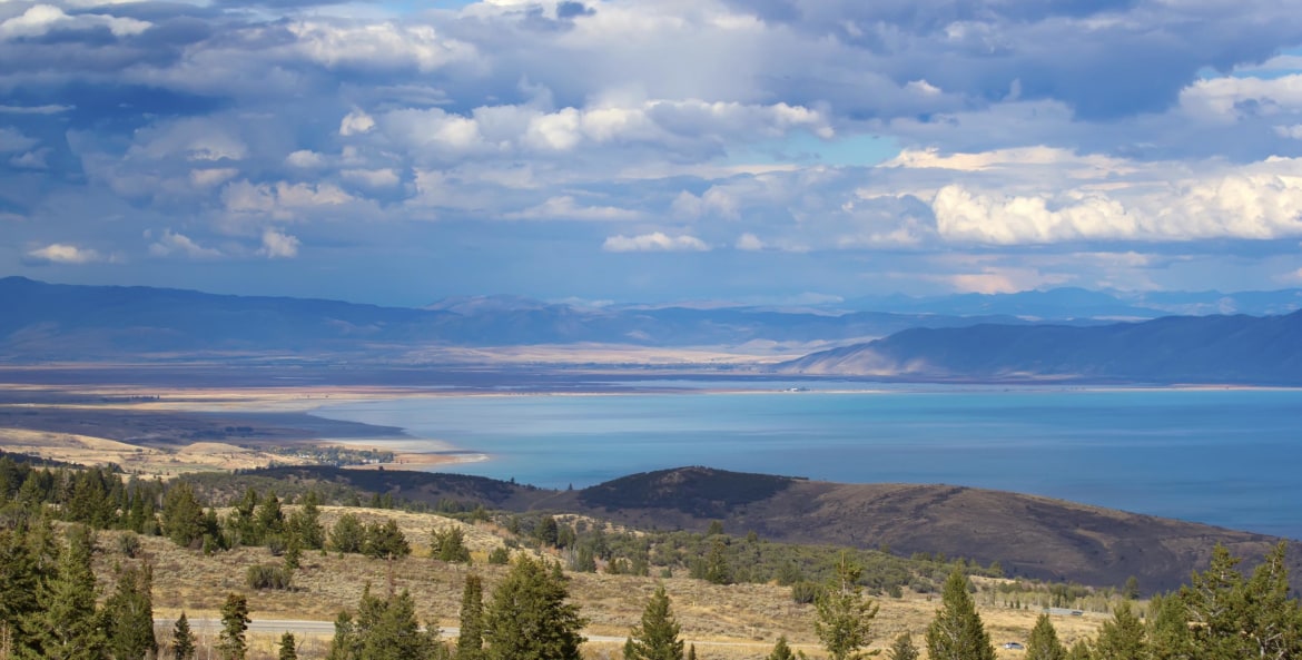 Panoramic of lake and hills in Utah's Bear Lake State Park.