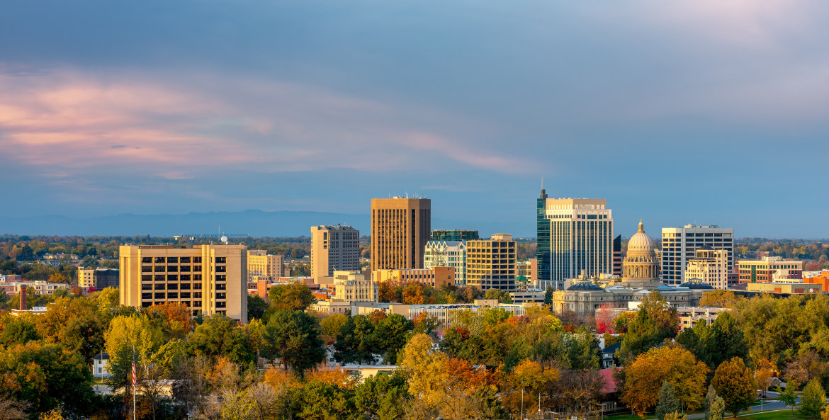 downtown Boise, including state capitol building and surrounding mountains
