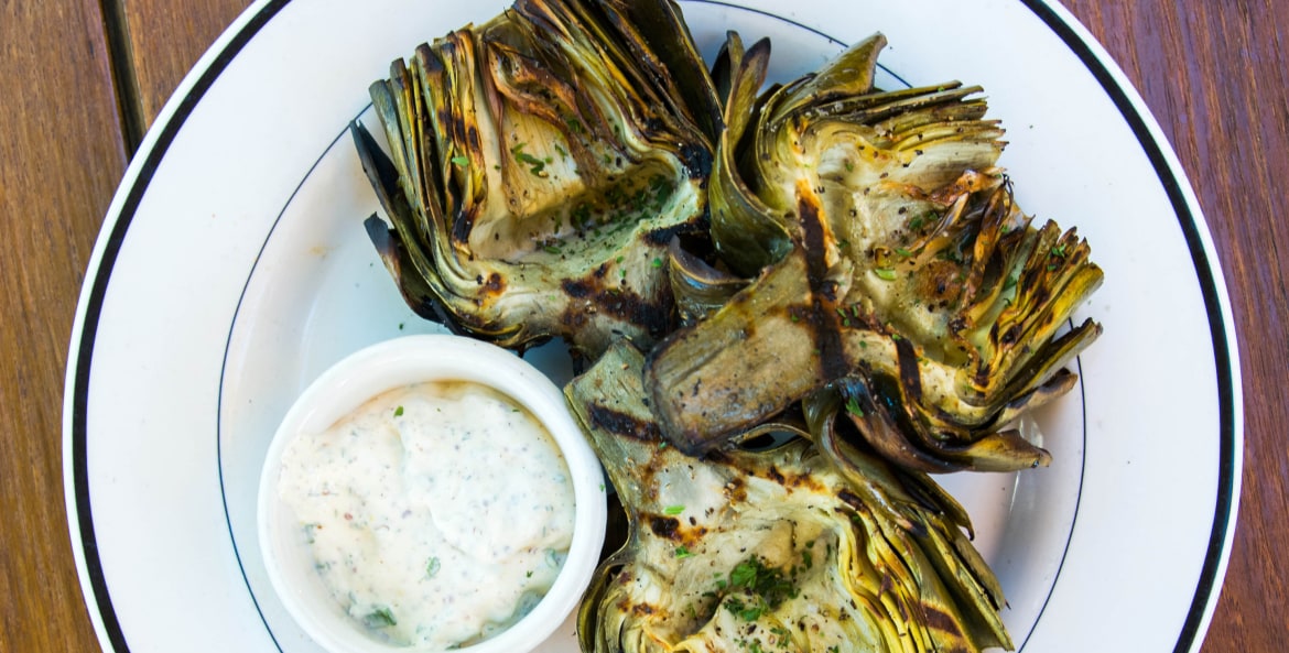 grilled artichokes served with herbed cream dipping sauce from Bandera restaurant in Scottsdale, Arizona