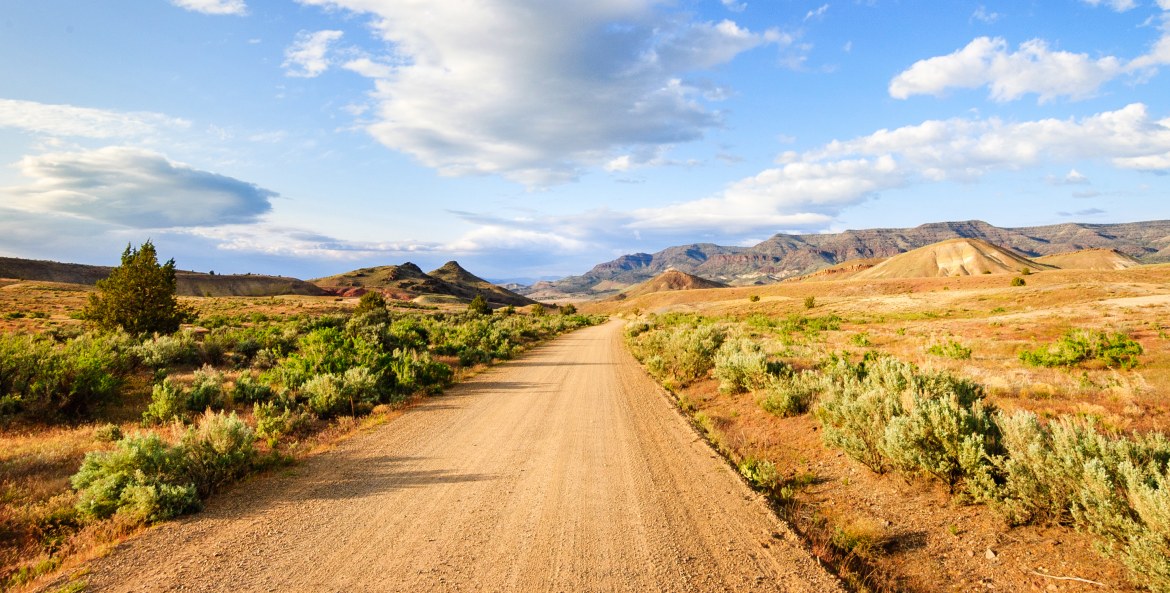 gravel road winds gently through John Day Fossil Beds National Monument, Eastern Oregon, picture