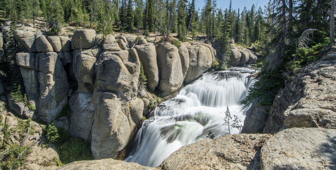 Terraced Falls cascades down rocky terrain near the southern end of southern end of Yellowstone National Park in Wyoming