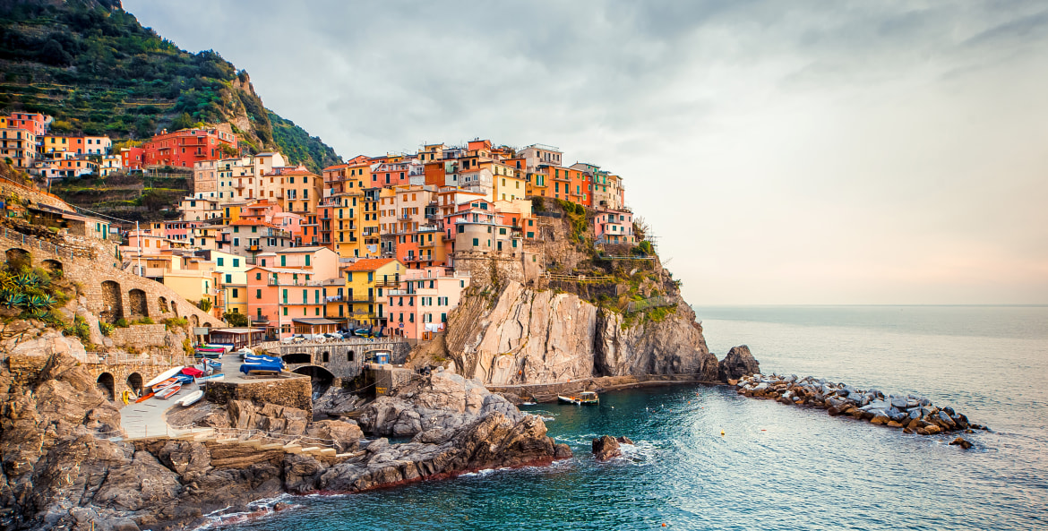 Manarola village overlooks the Ligurian Sea in Italy's Cinque Terre, photo