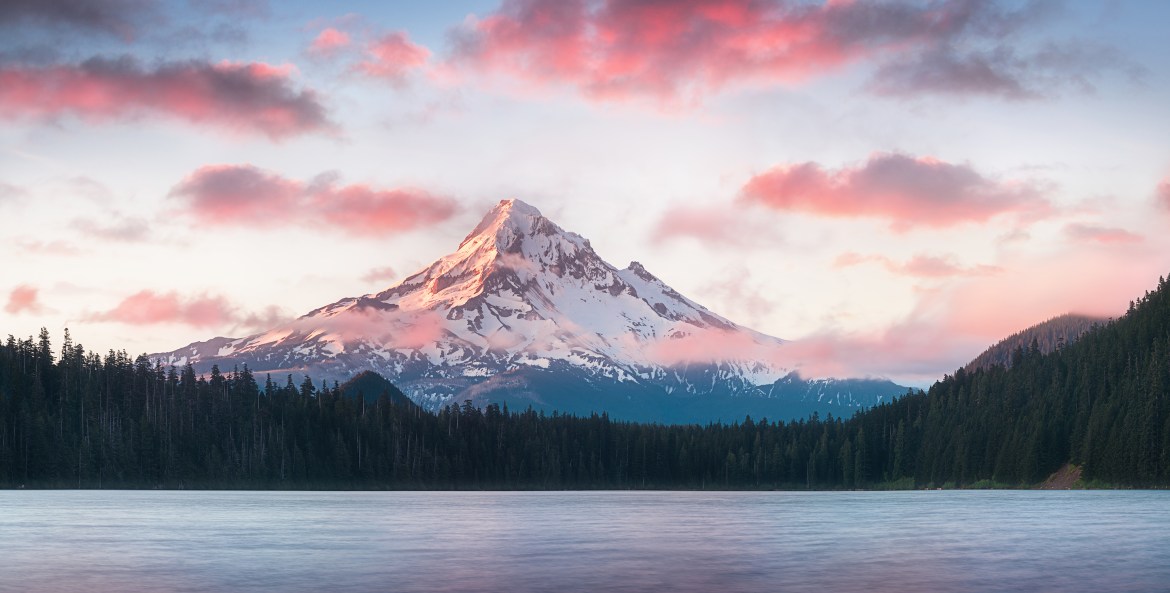 Mount Hood rises behind Lost Lake at sunrise, image.