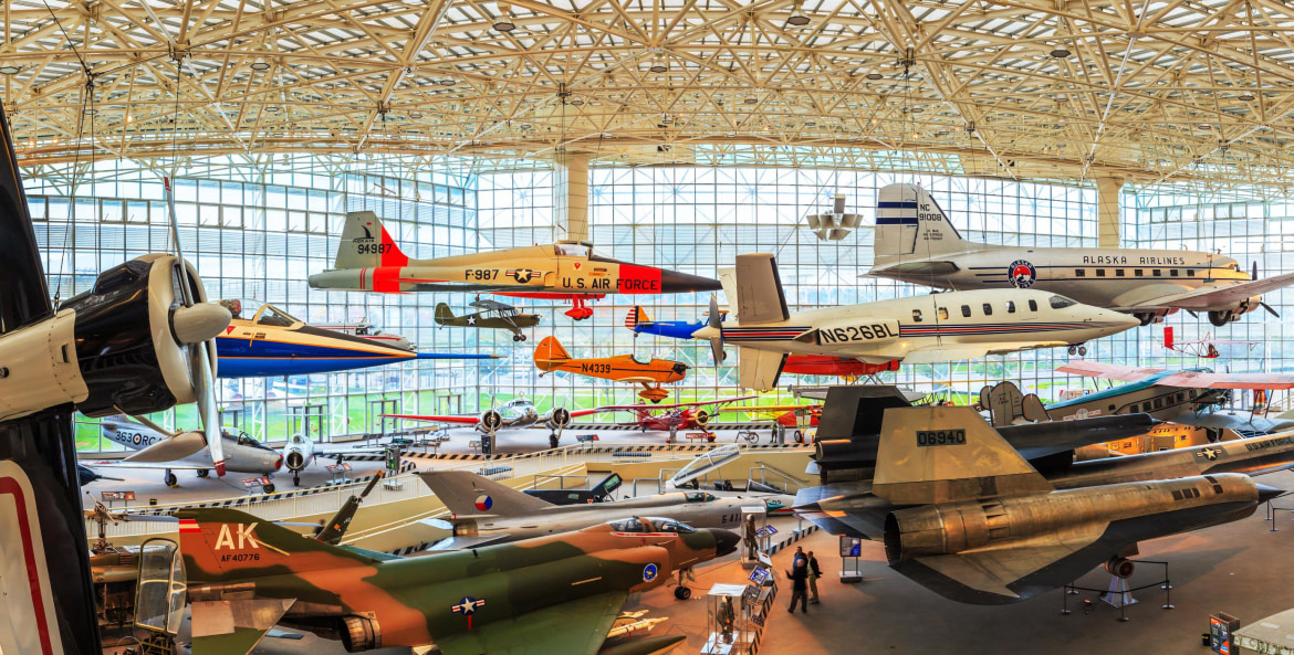 airplanes hanging in a museum, picture