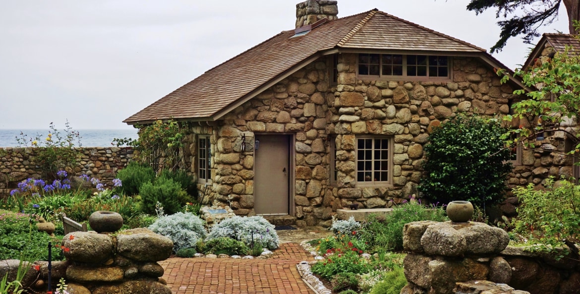 picture of Tor House in Carmel with grey sky in the background