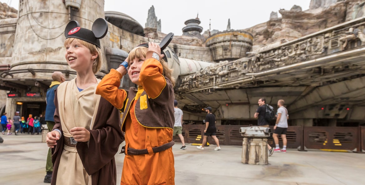 Brothers stand in Disneyland Resort's Star Wars: Galaxy's Edge.