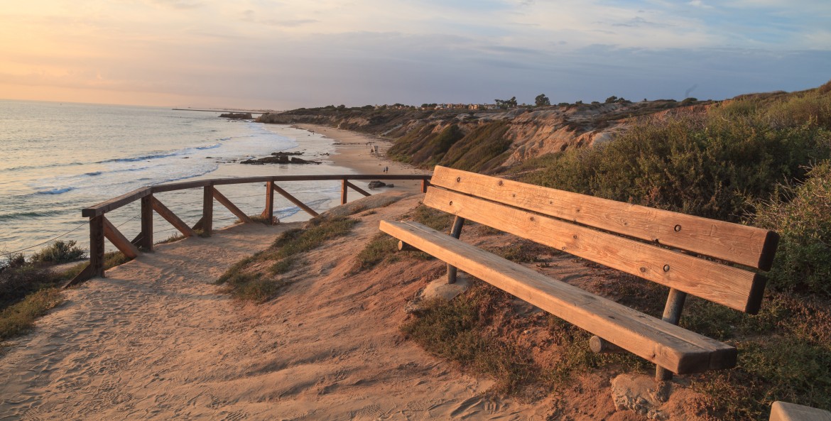 Stairs leading to the beach at sunset at Crystal Cove State Park in Laguna Beach, California, image