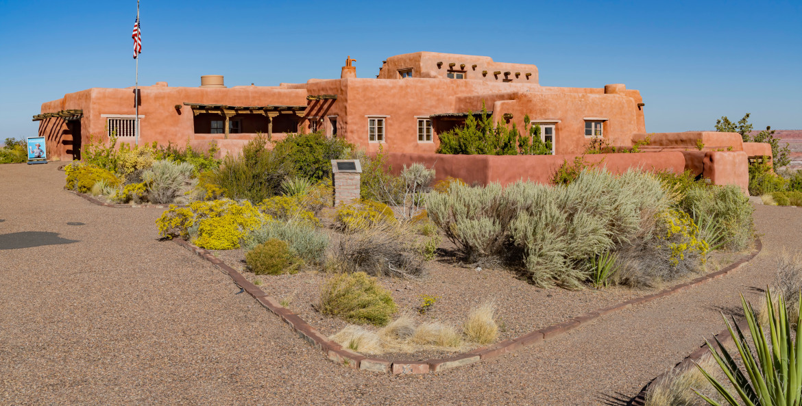 The adobe Painted Desert Inn in Petrified Forest National Park on a clear day.