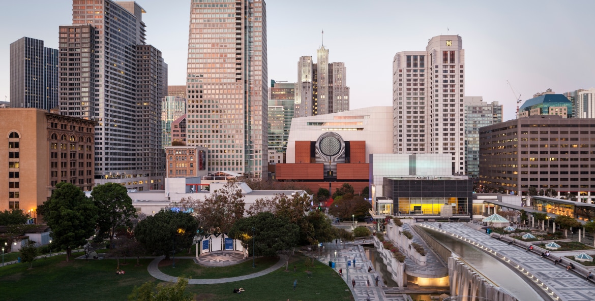 San Francisco Museum of Modern Art and Yerba Buena Gardens with San Francisco's skyline in the background.