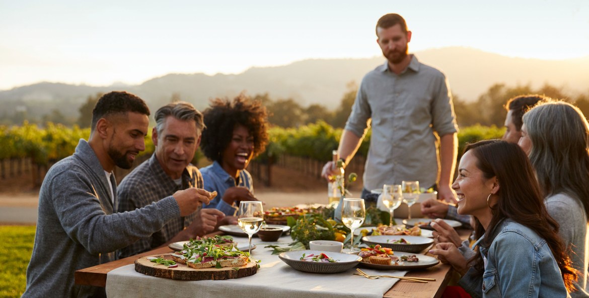 People dine outside at the Farm-to-Table Dinner at Kendall-Jackson in Fulton, California.