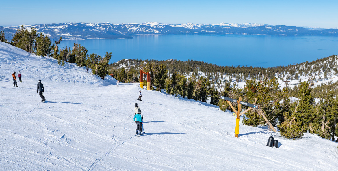 Skiers and snowboarders at the top of Big Dipper at Heavenly Mountain Resort in South Lake Tahoe, Nevada.
