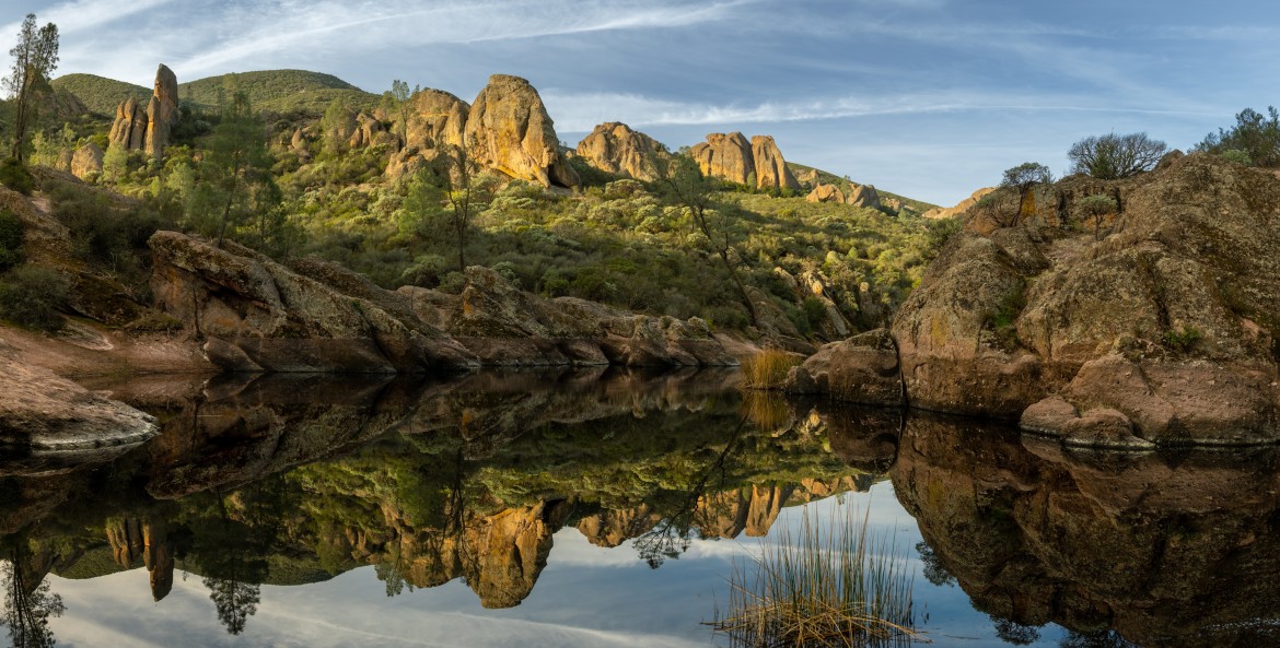 Bear Gulch Reservoir in Pinnacles National Park on a party cloudy day.