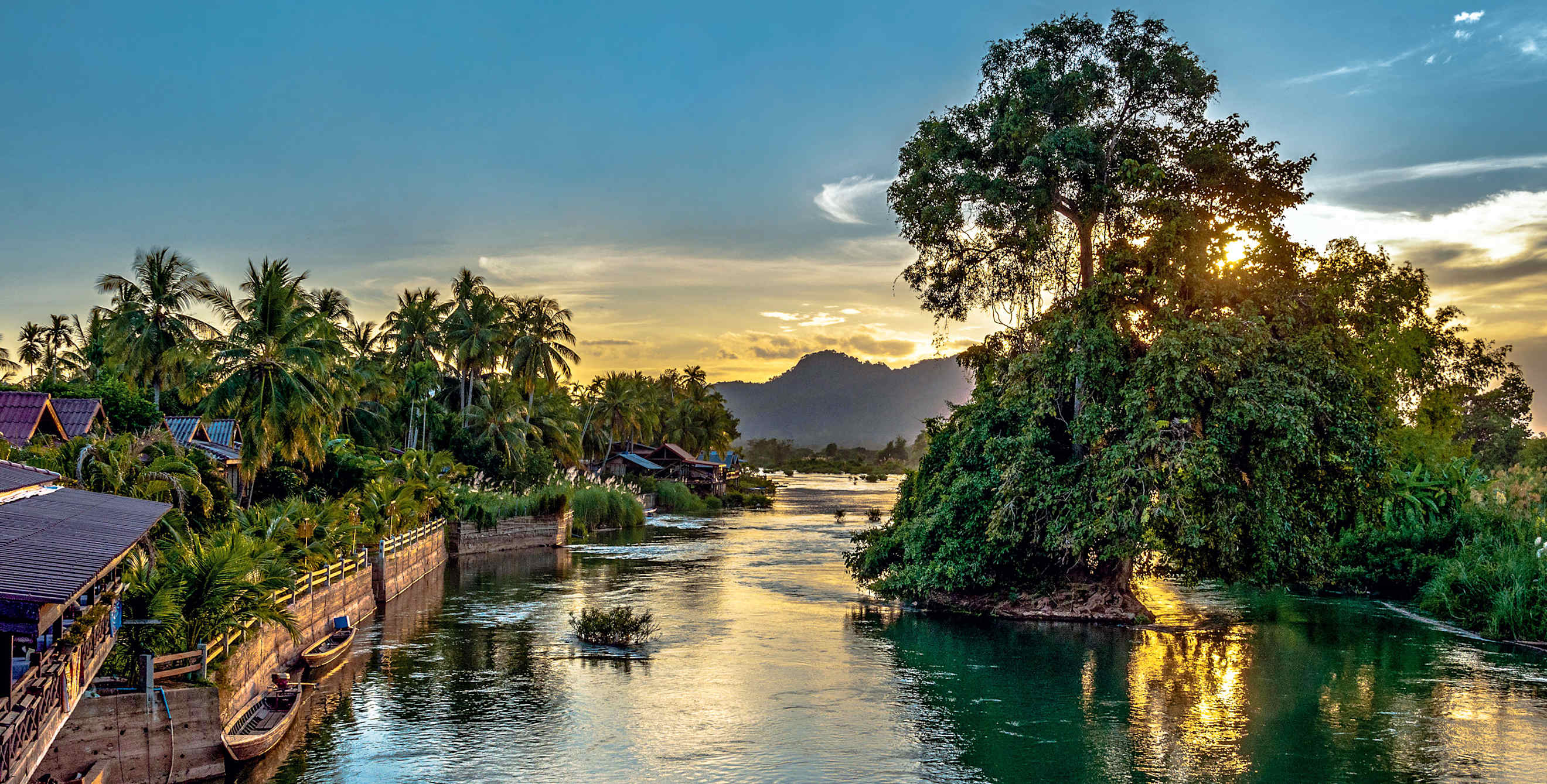The Mekong River flows serenely through the Si Phan Don (4,000 Islands) in Laos, image