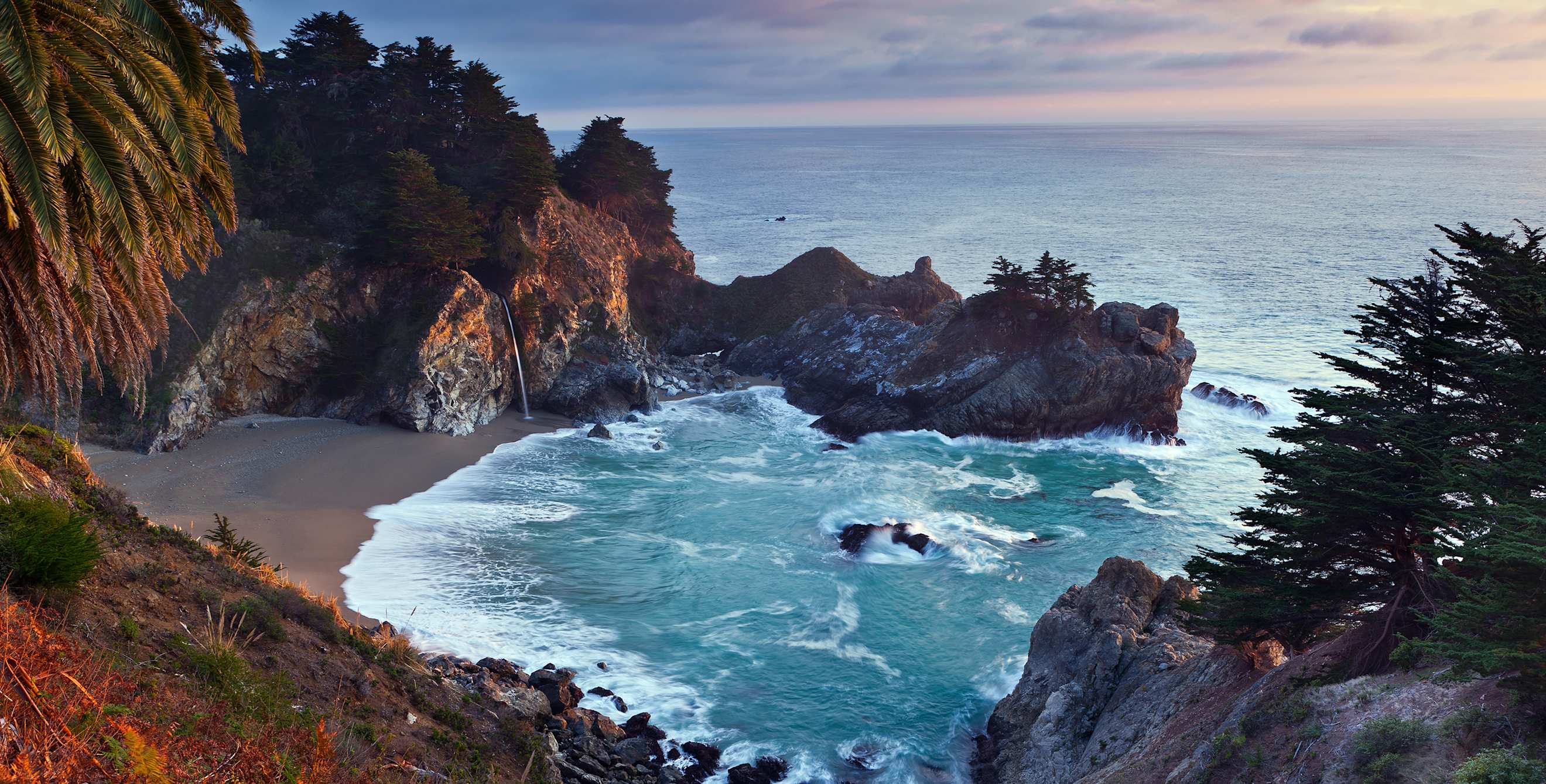 McWay Falls in Big Sur, California in fall at sunset