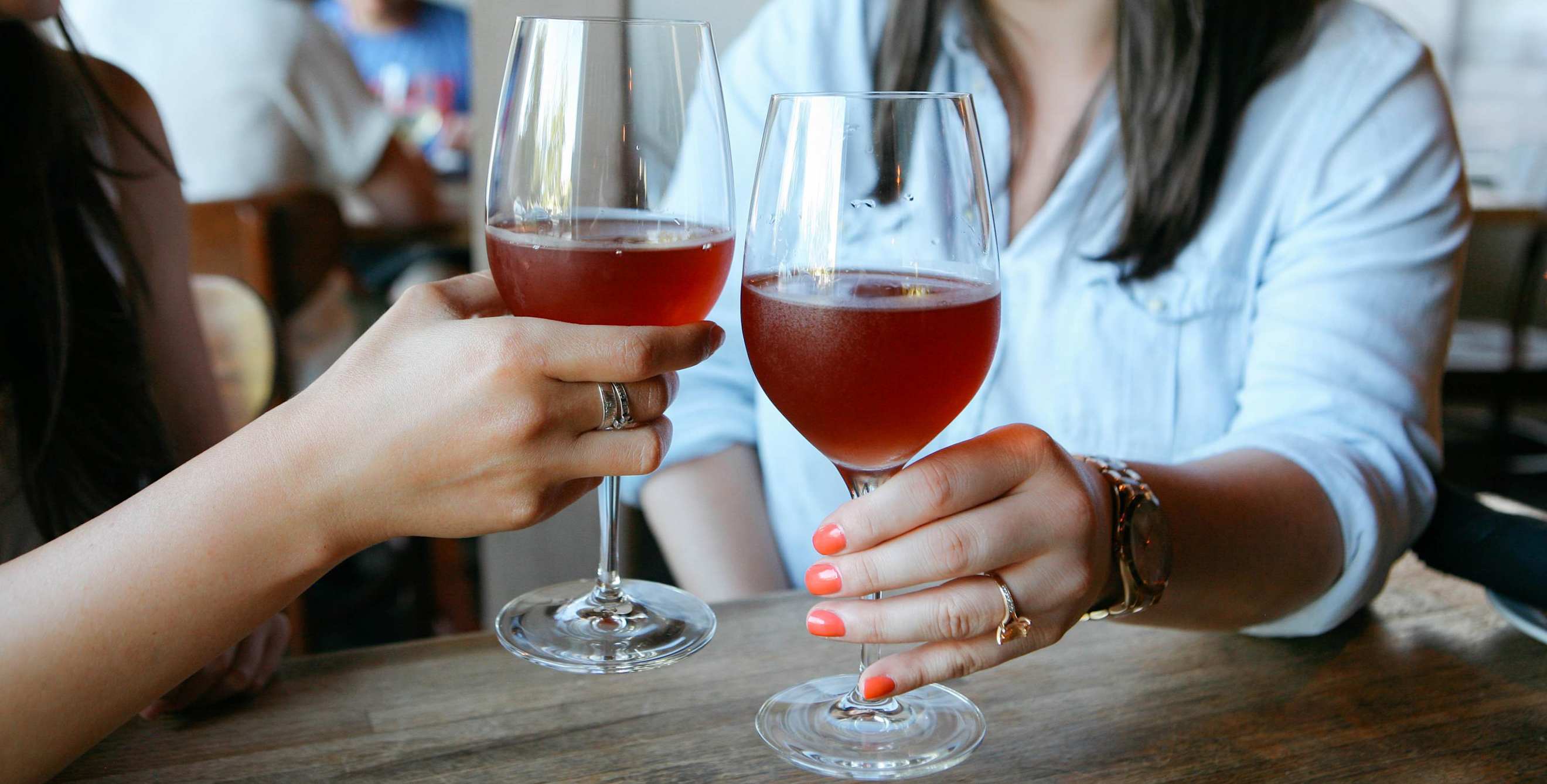 Friends toast at Revolution Wines in Midtown Sacramento, California, picture