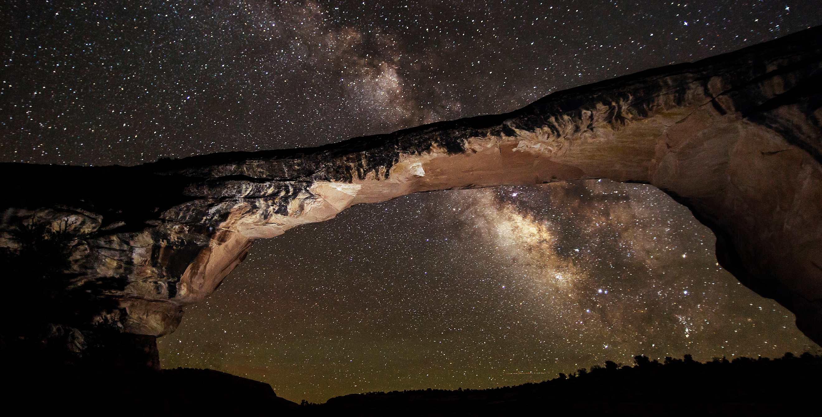 Stars above Natural Bridges National Monument at night