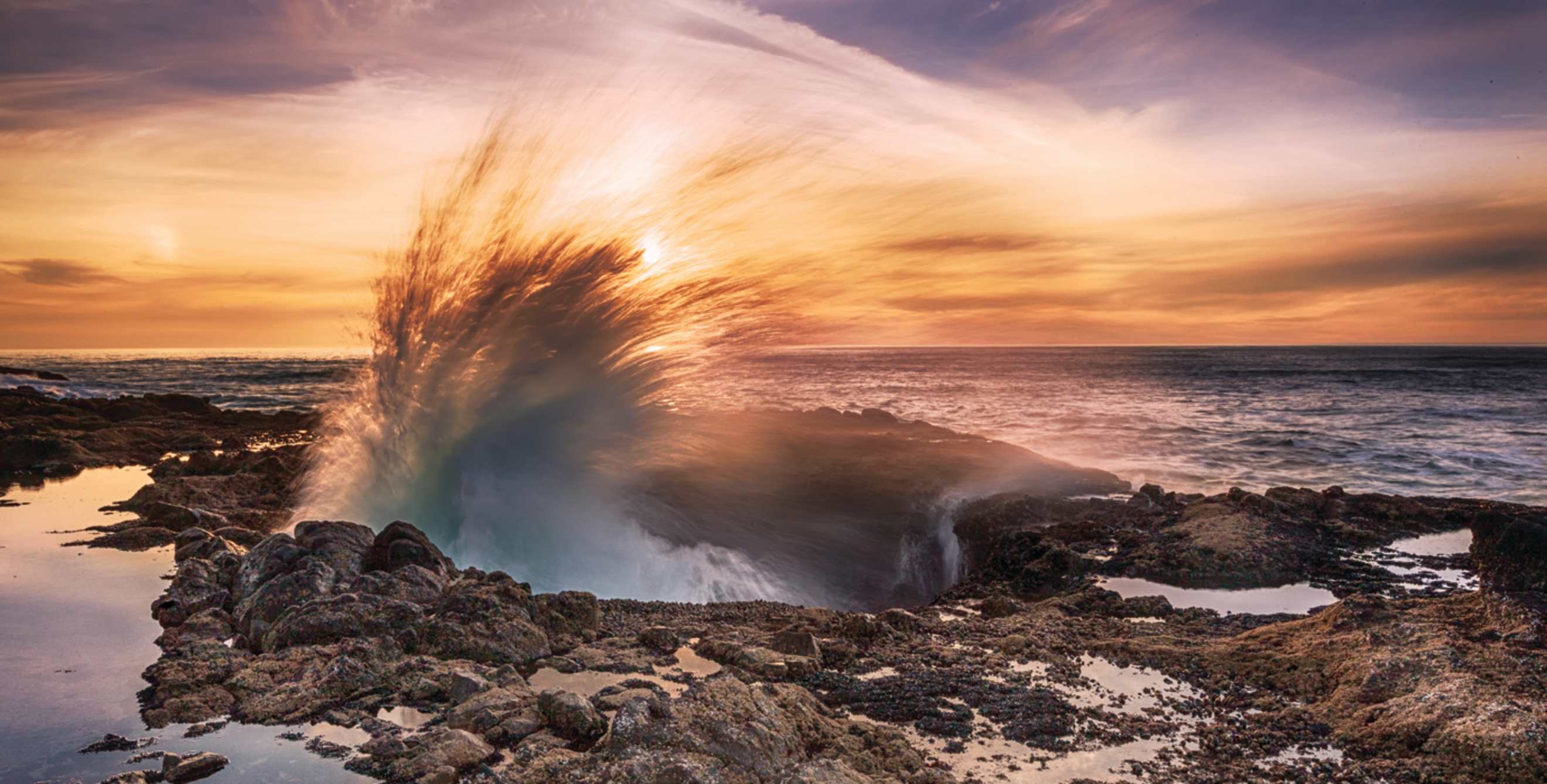 the ocean spray hits Cape Perpetua Scenic Area in Oregon, picture