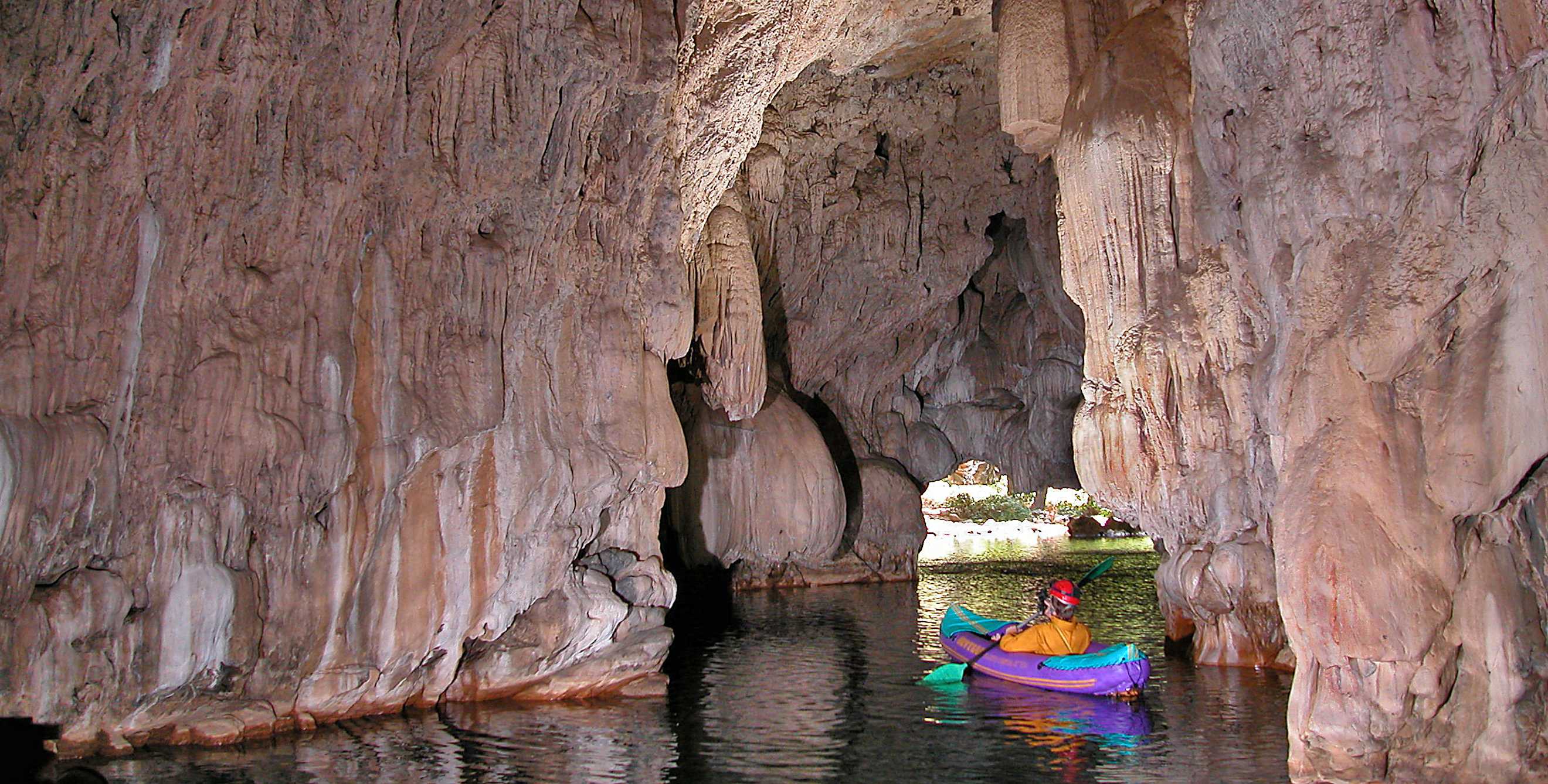 kayaker paddles through underground cave at Natural Bridges near Vallecito, California, picture
