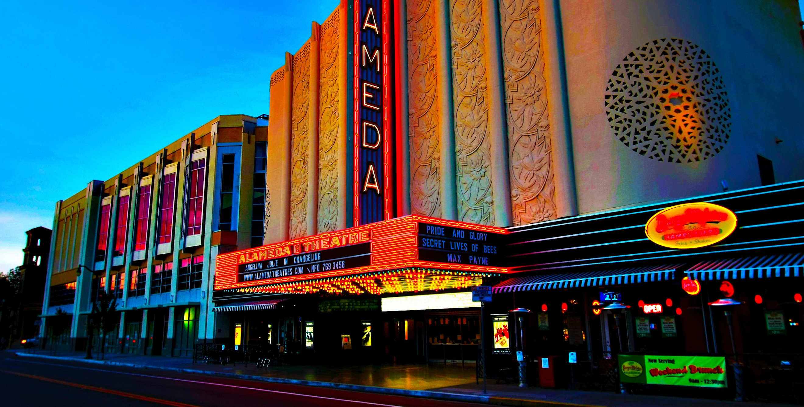 Alameda Theatre & Cineplex lit up at night