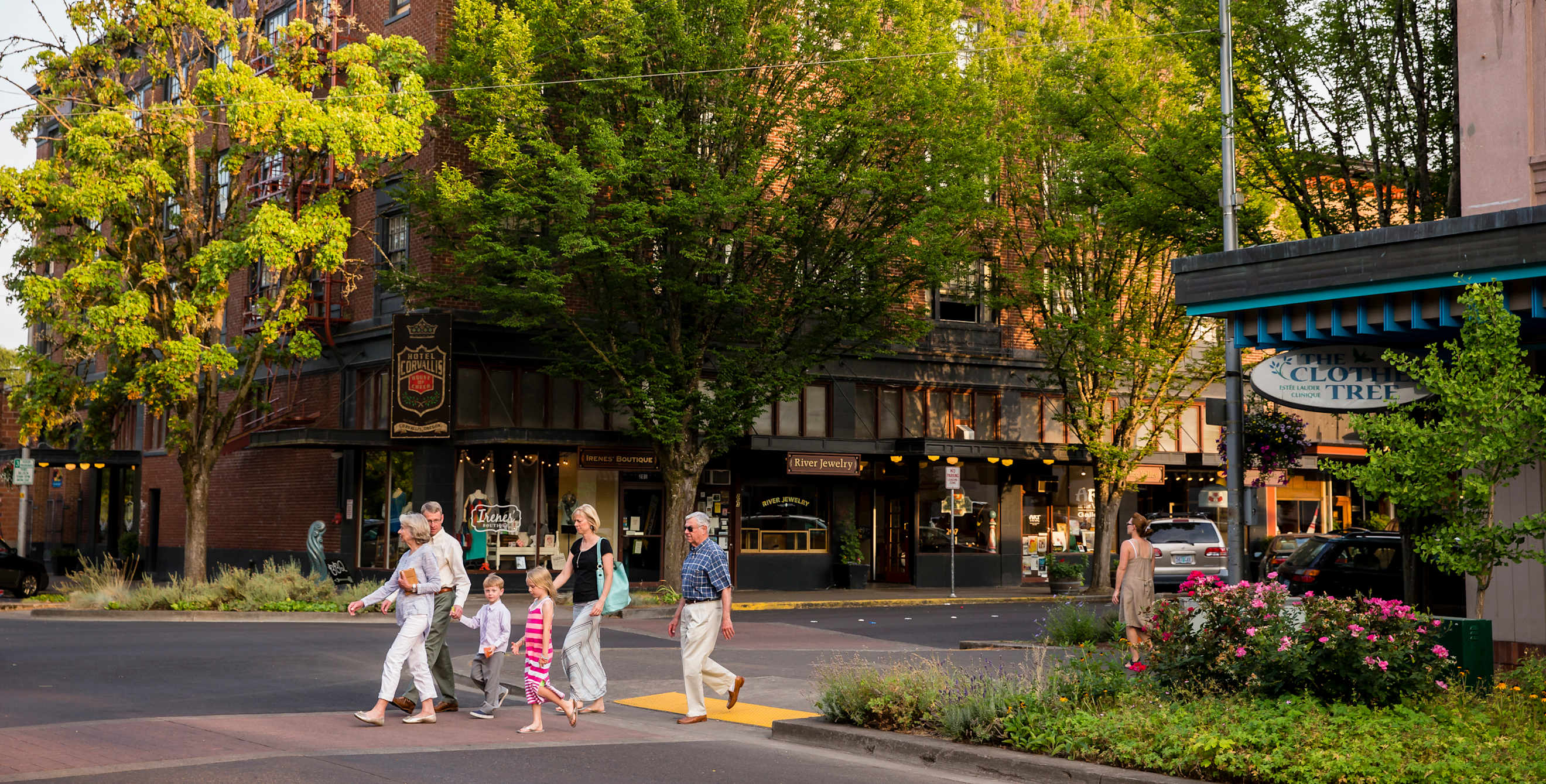family crosses street in downtown Corvallis, Oregon, picture