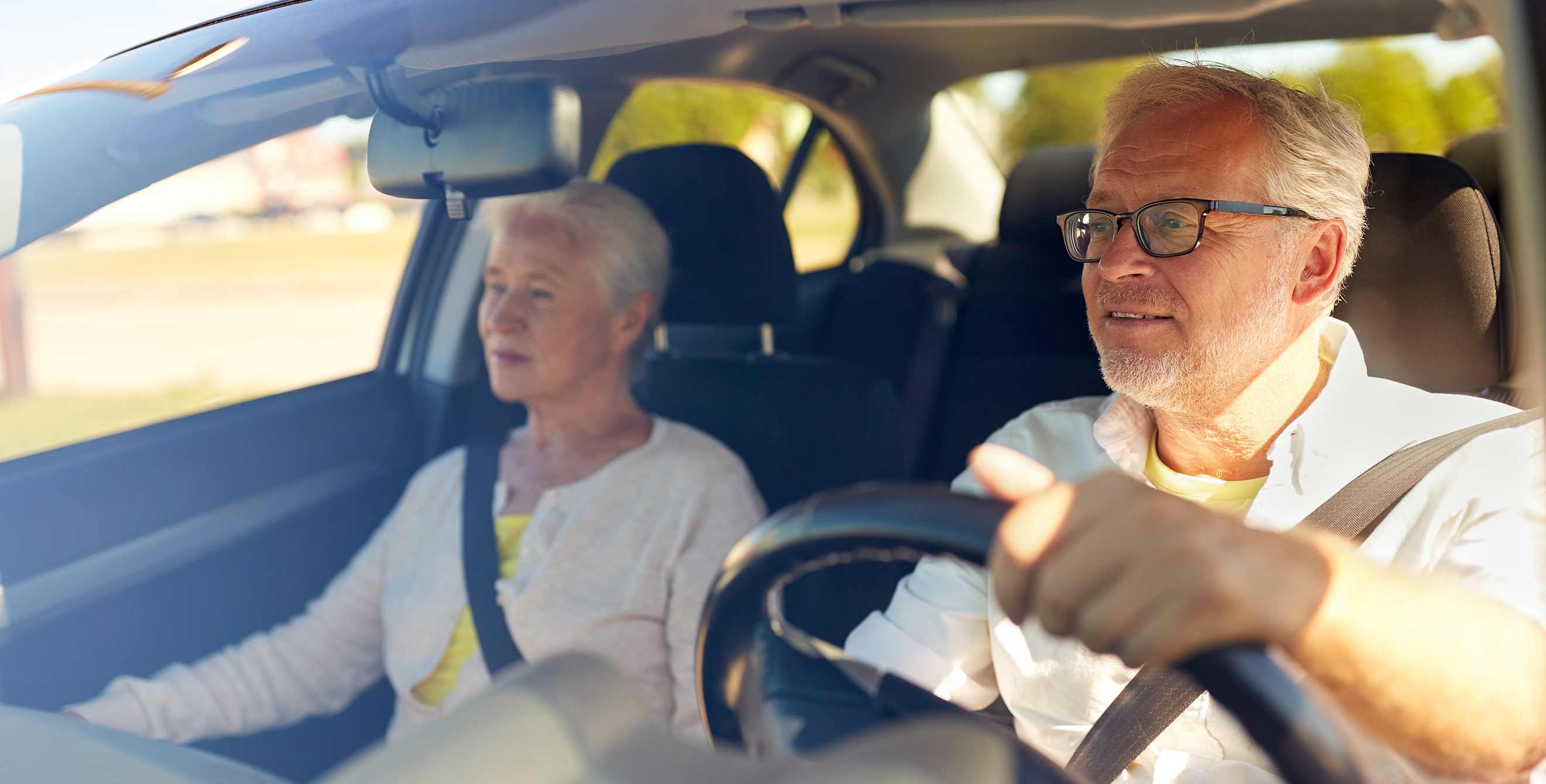 Two seniors in the car