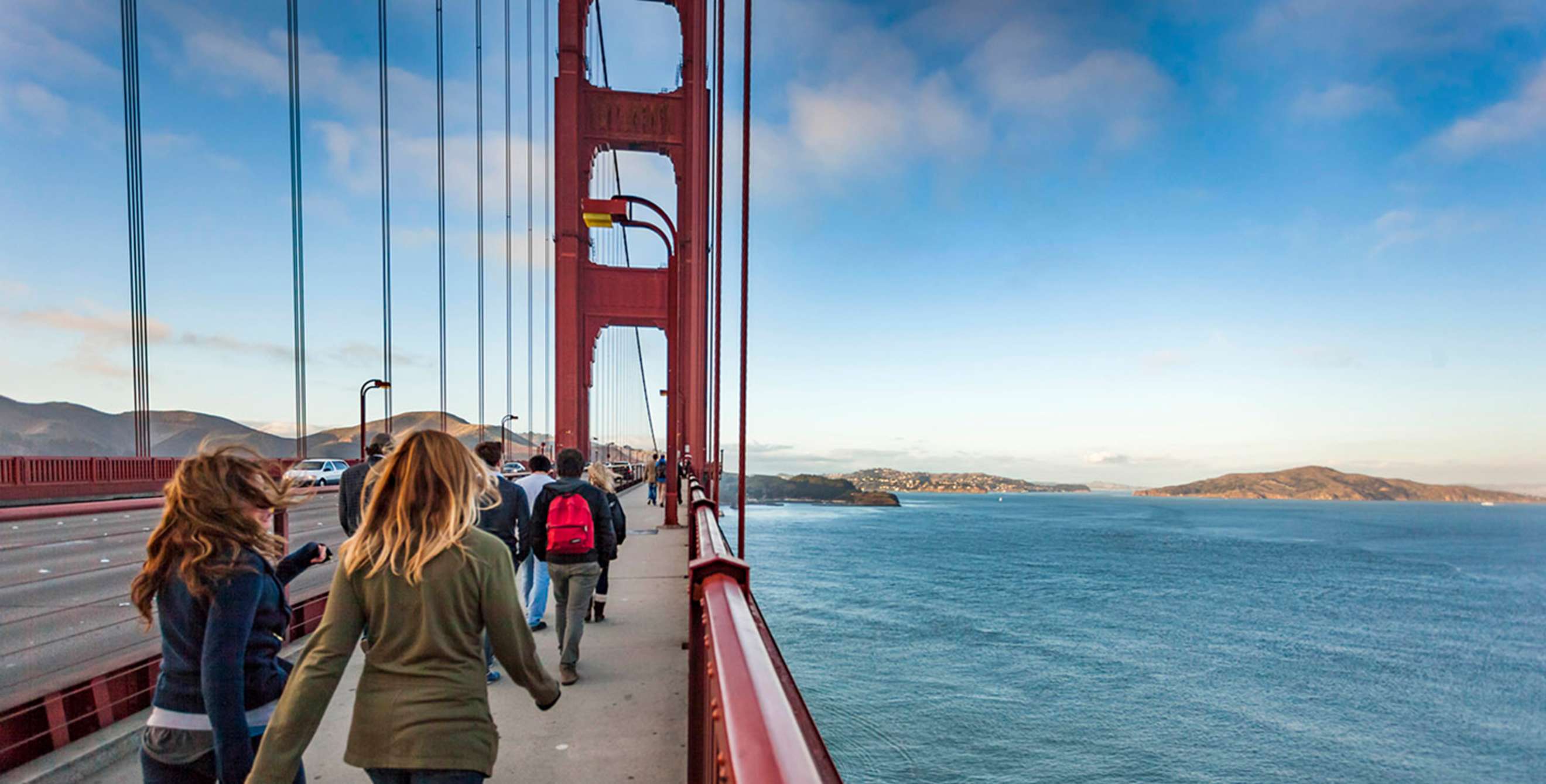 People walking across the Golden Gate Bridge in San Francisco, California, picture