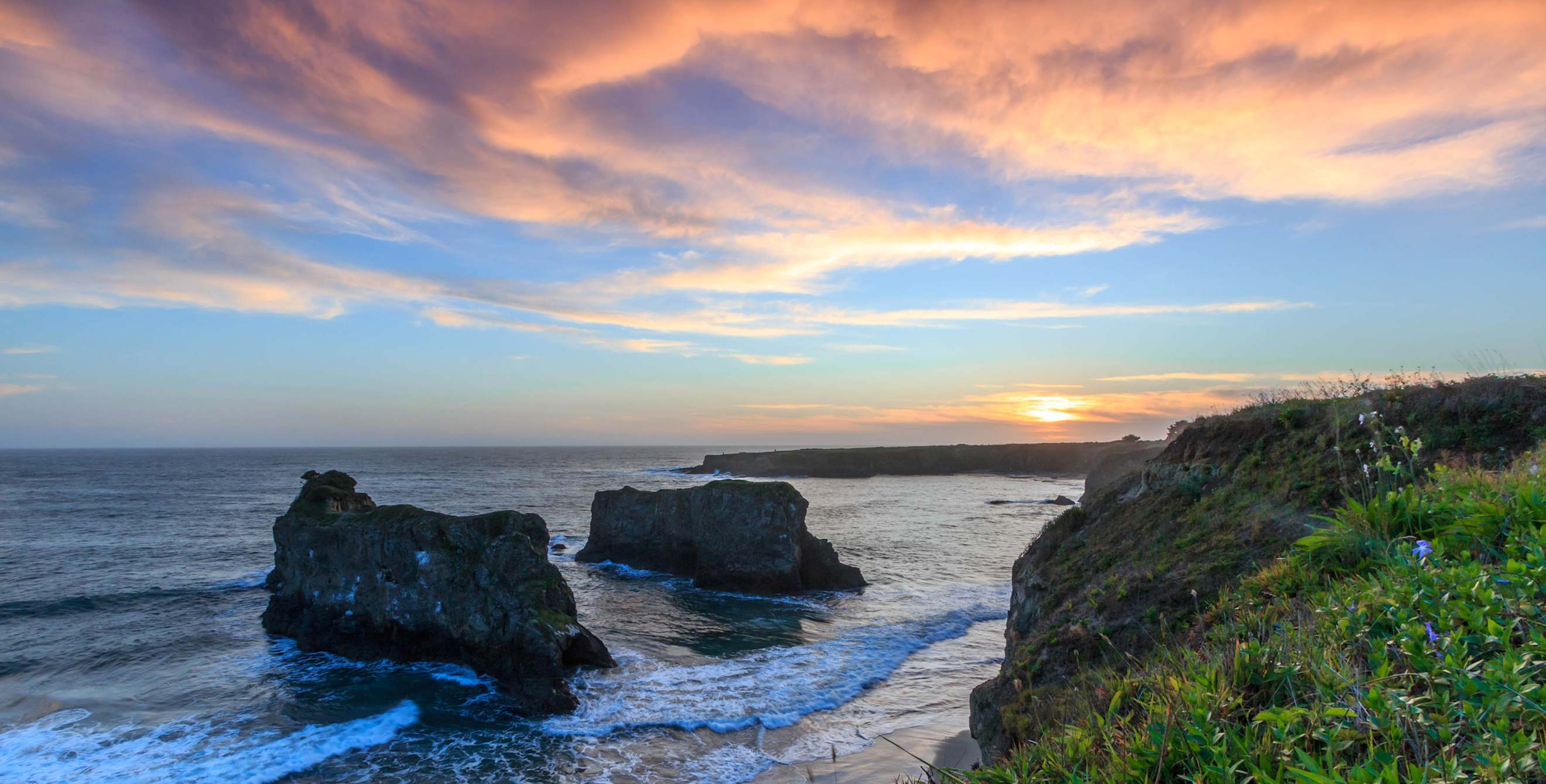 churning waves lick the sandstone cliffs of Mendocino County's Coast, image