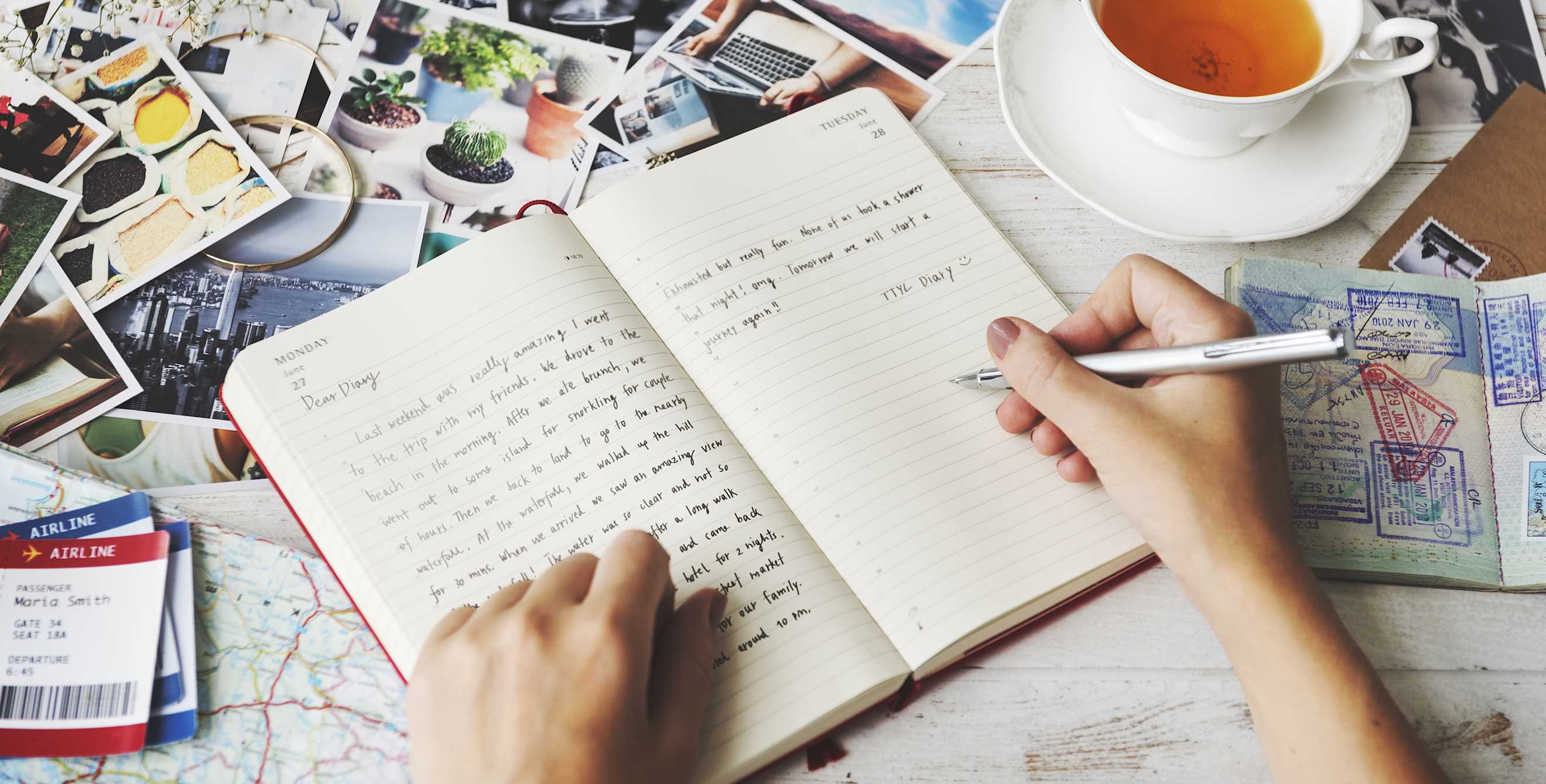 person working on travel memories project, picture