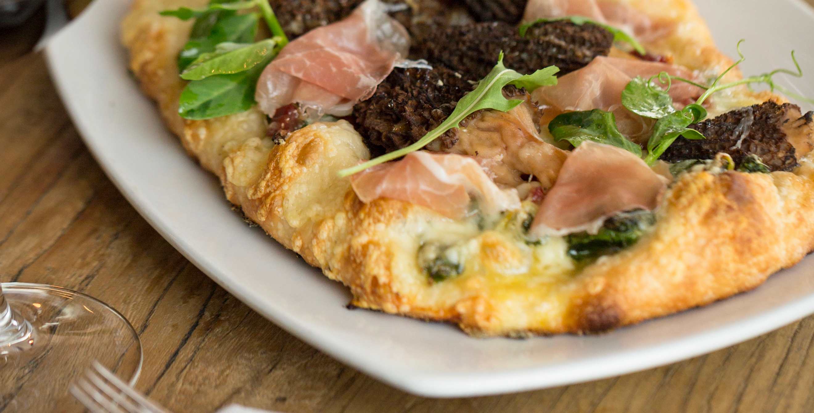 the flatbread with prosciutto and fig jam at Lucia Restaurant
