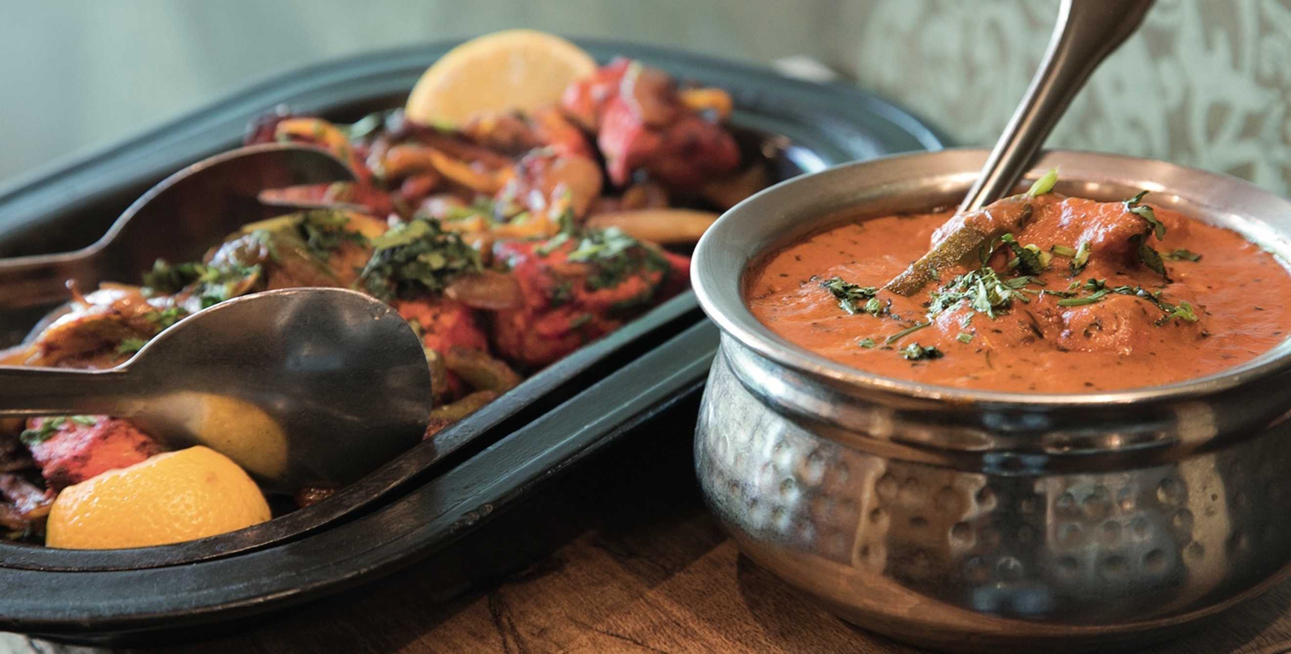 chicken tikka two ways—on a sizzling platter or in a saucy bowl—at Tandoori Oven in Logan, Utah, picture
