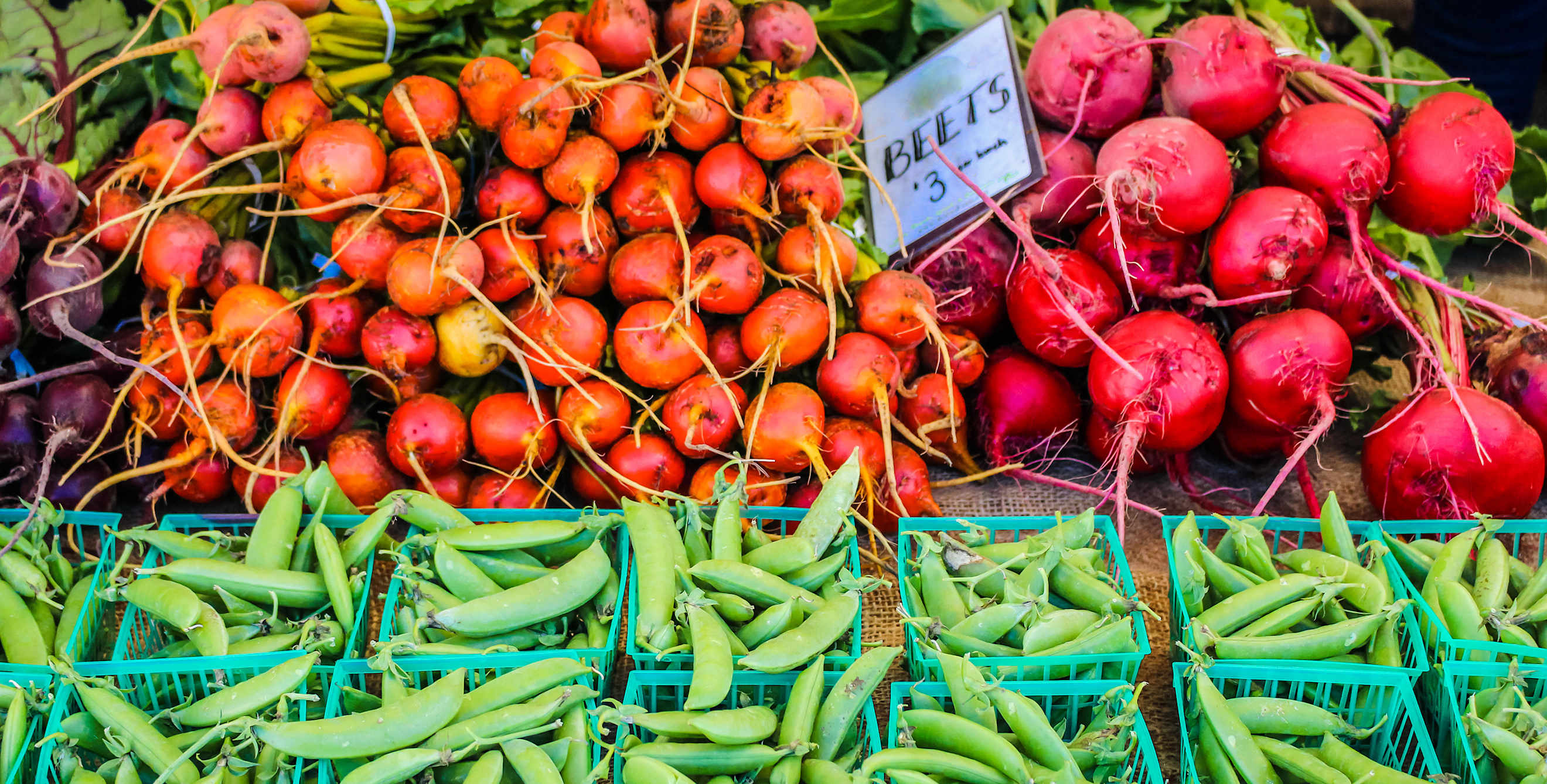 Beans and beets at a farmers' market.