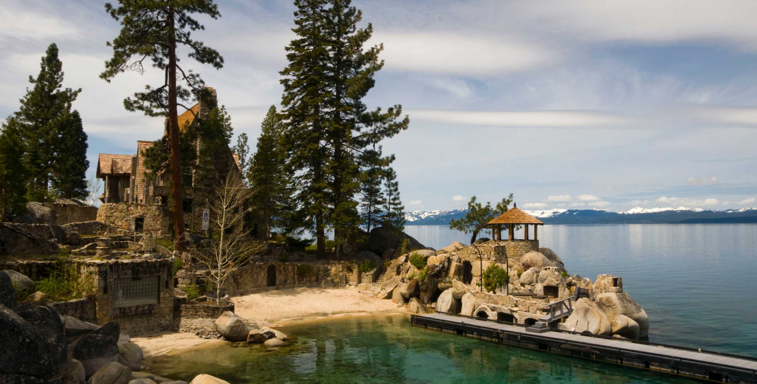 Thunderbird Lodge with its Tudor-style stonework and Ponderosa pine setting by the Lake Tahoe shoreline in Nevada's Incline Village