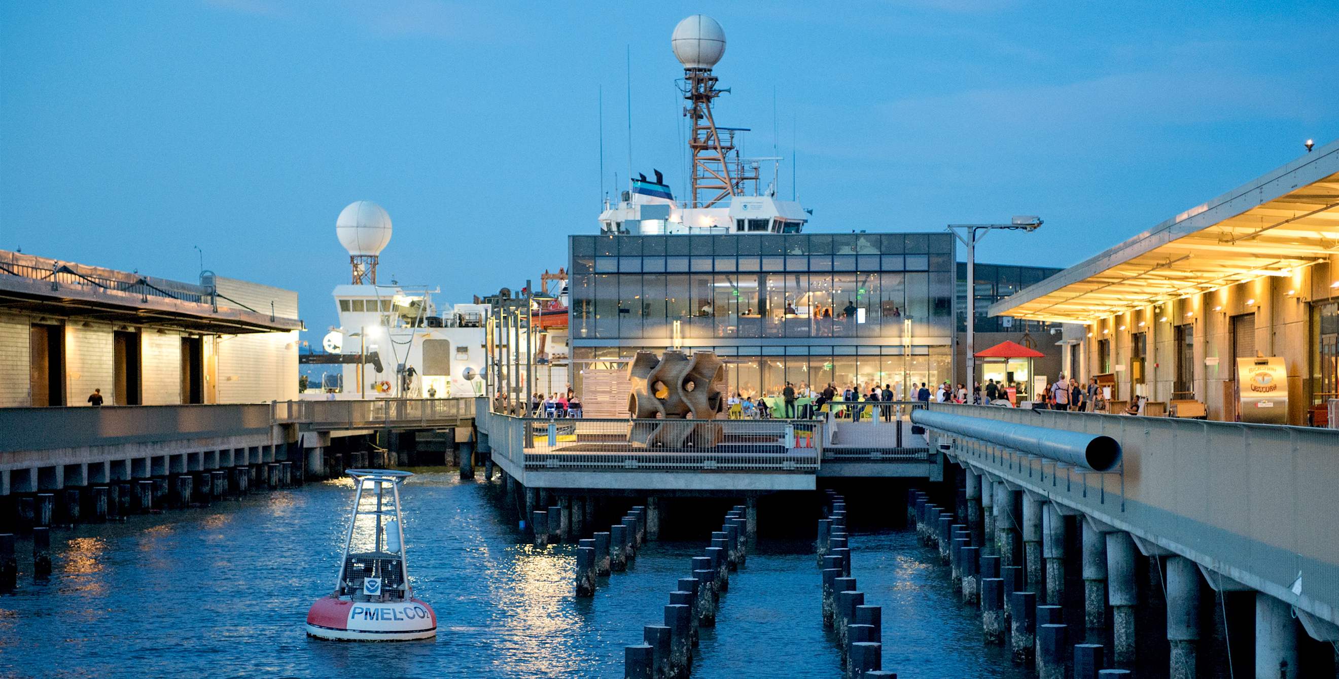 exterior view at twilight of The Exploratorium at Pier 15 in San Francisco, California