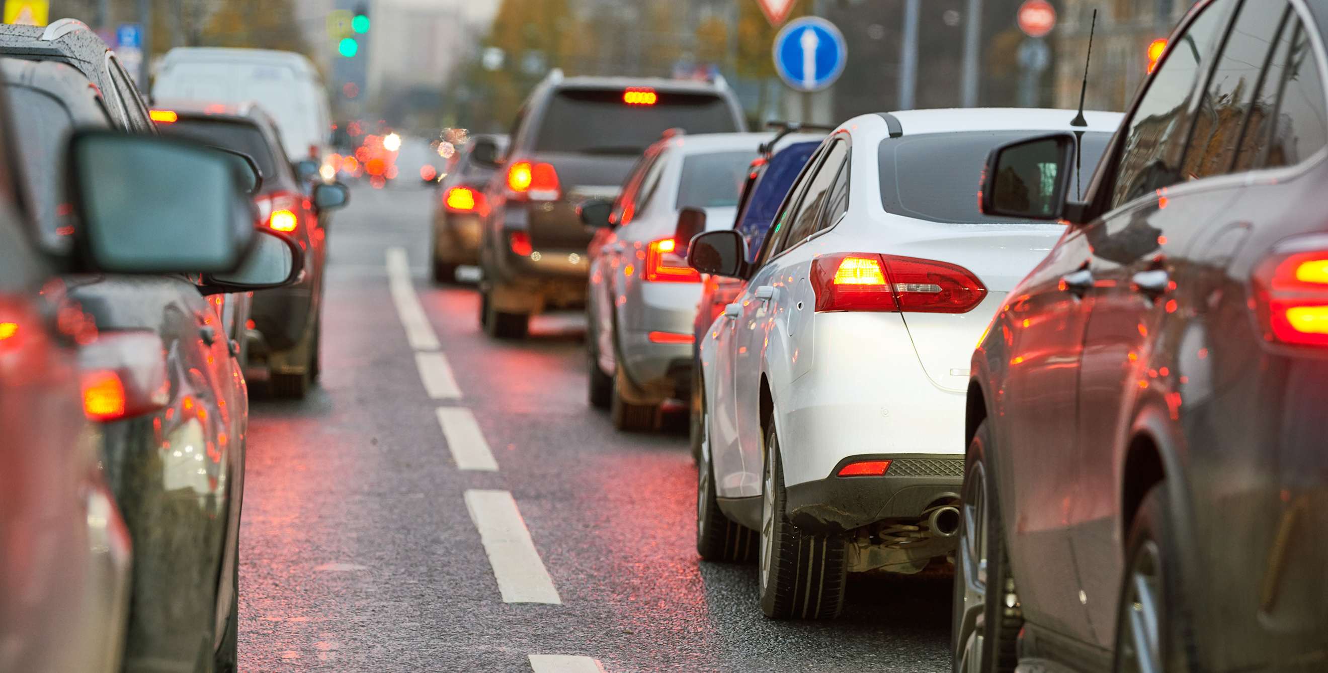 line of traffic on a city road.