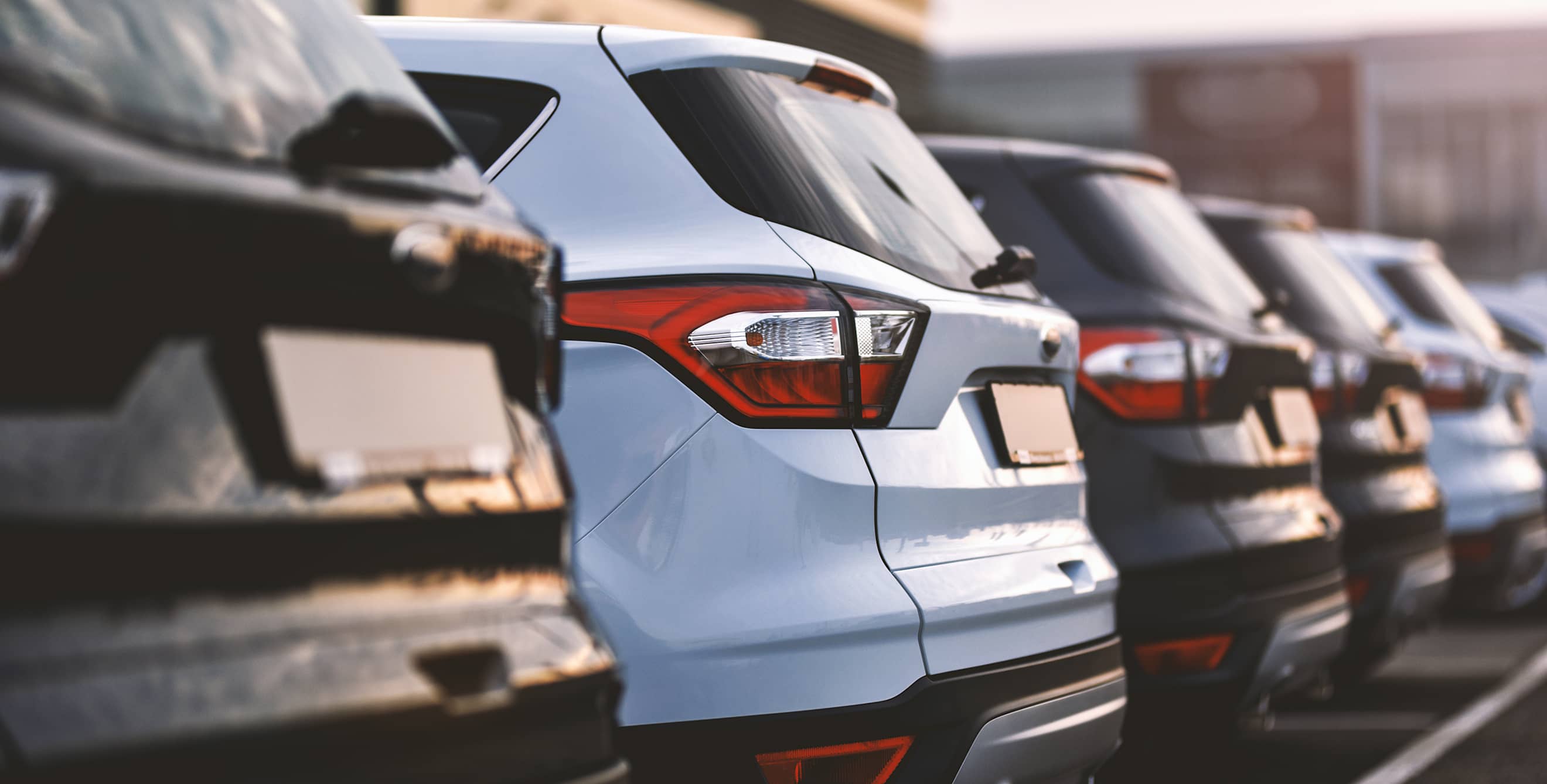 A lineup of cars at a dealership