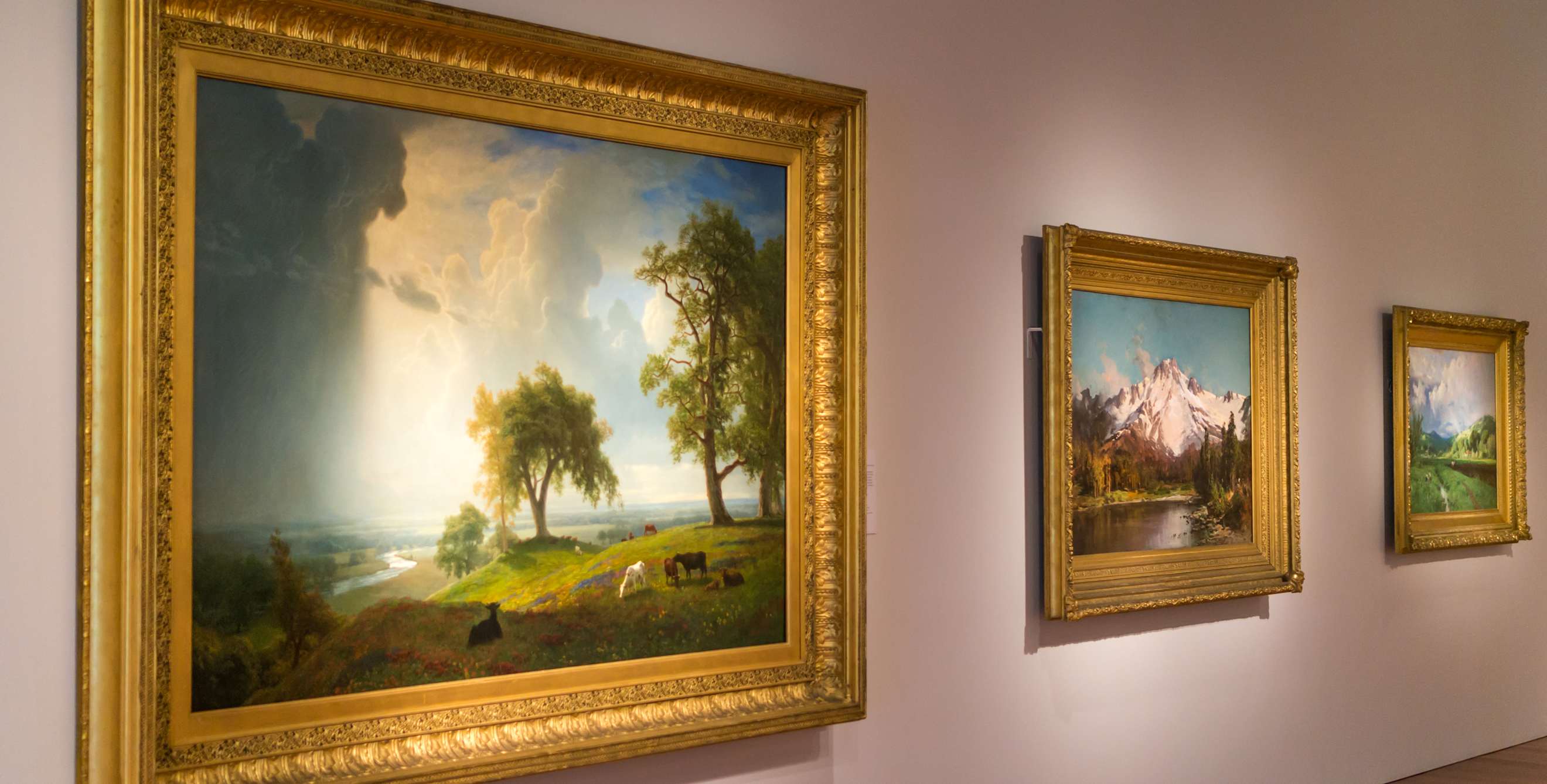 Fine art paintings hanging on the wall of the de Young Museum in San Francisco