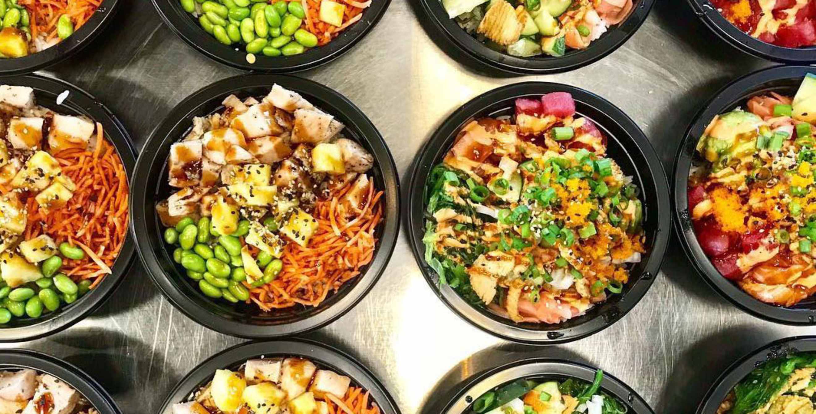 a selection of poke bowls from Paddles Up Poké in Boise