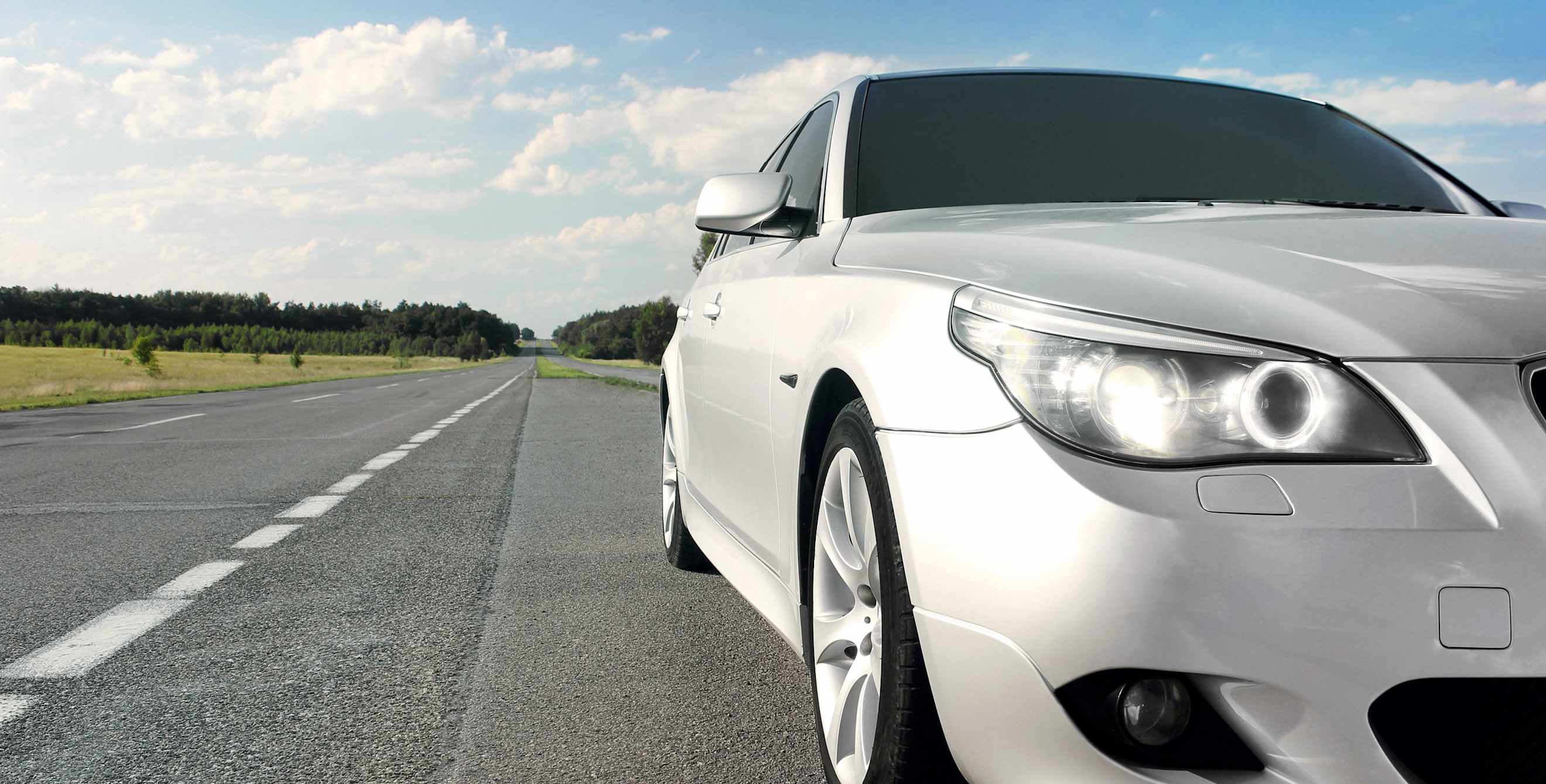 Advanced driver assistance systems (ADAS) car on highway shoulder