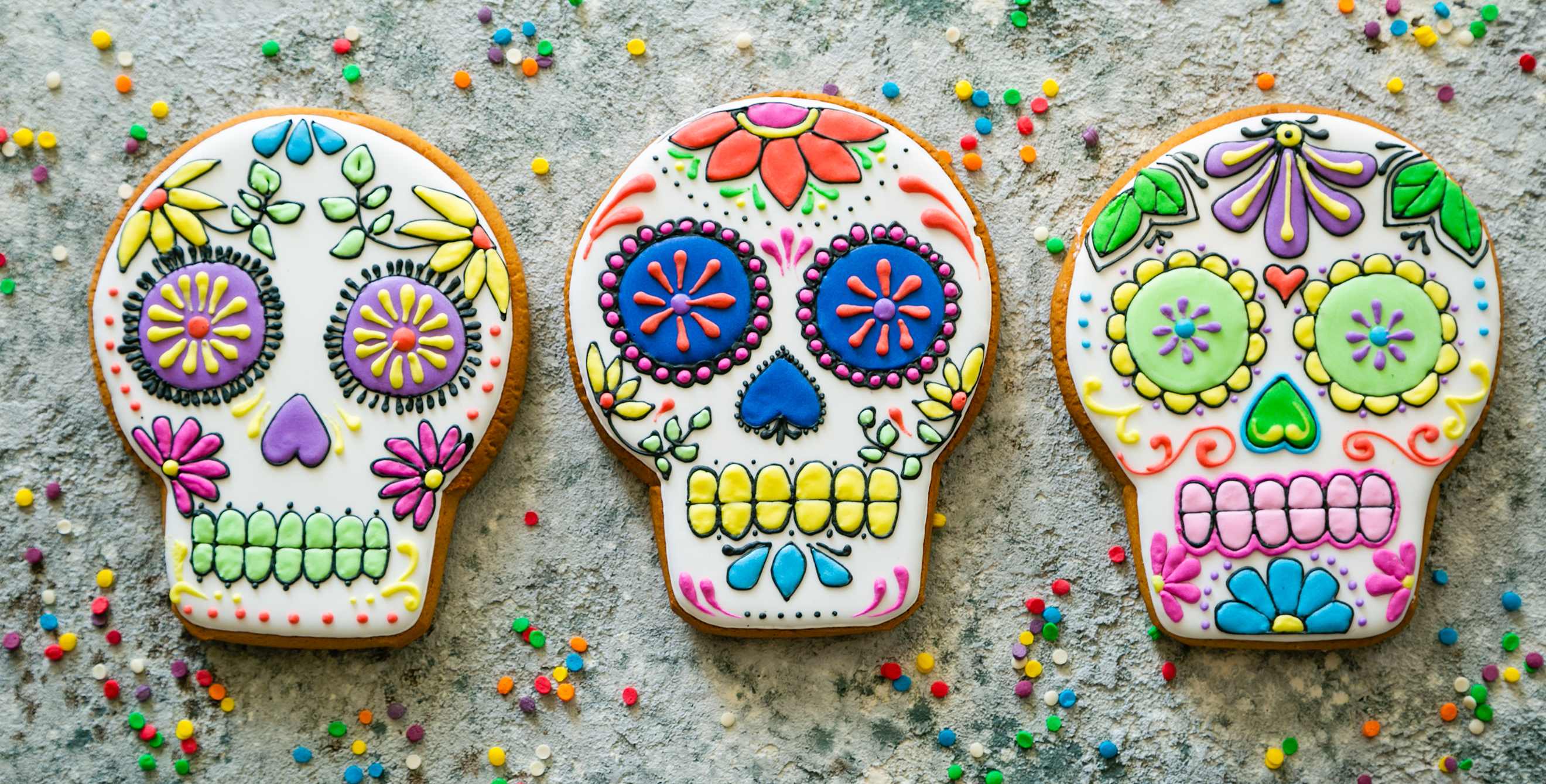 Cookies decorated like sugar skulls for Day of the Dead.