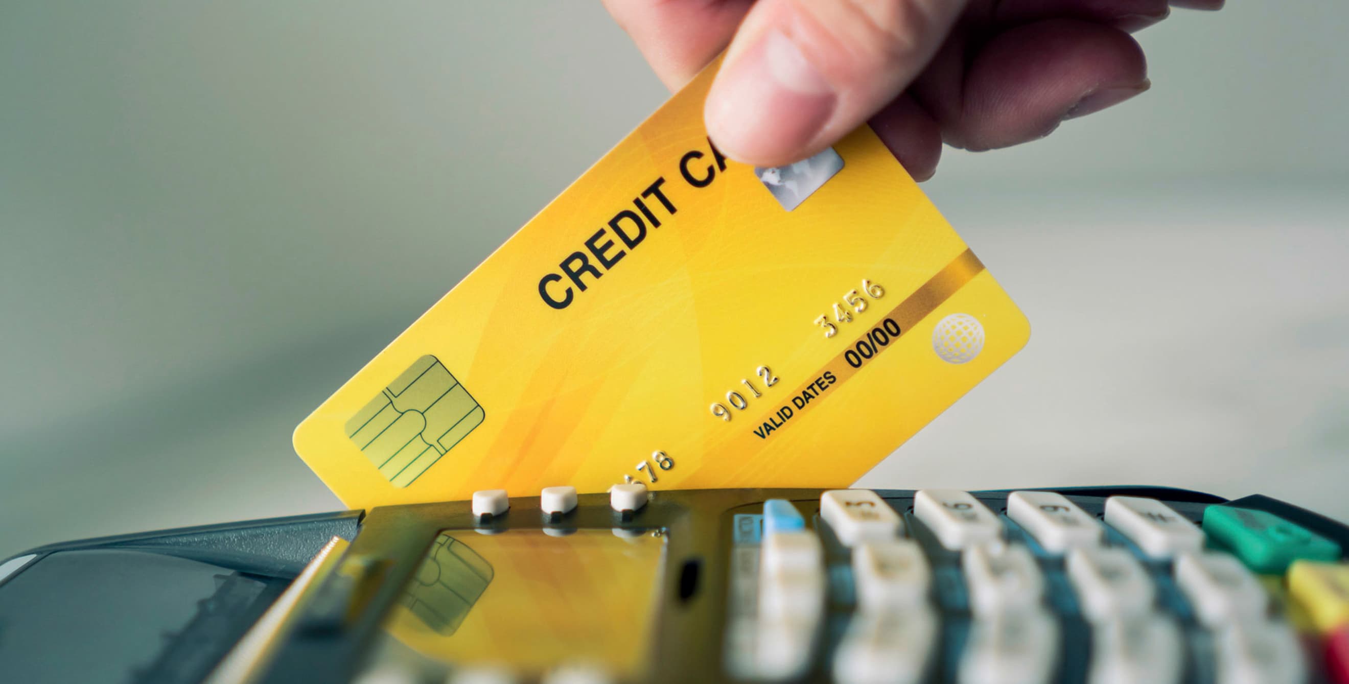 Swiping a credit card at pay device
