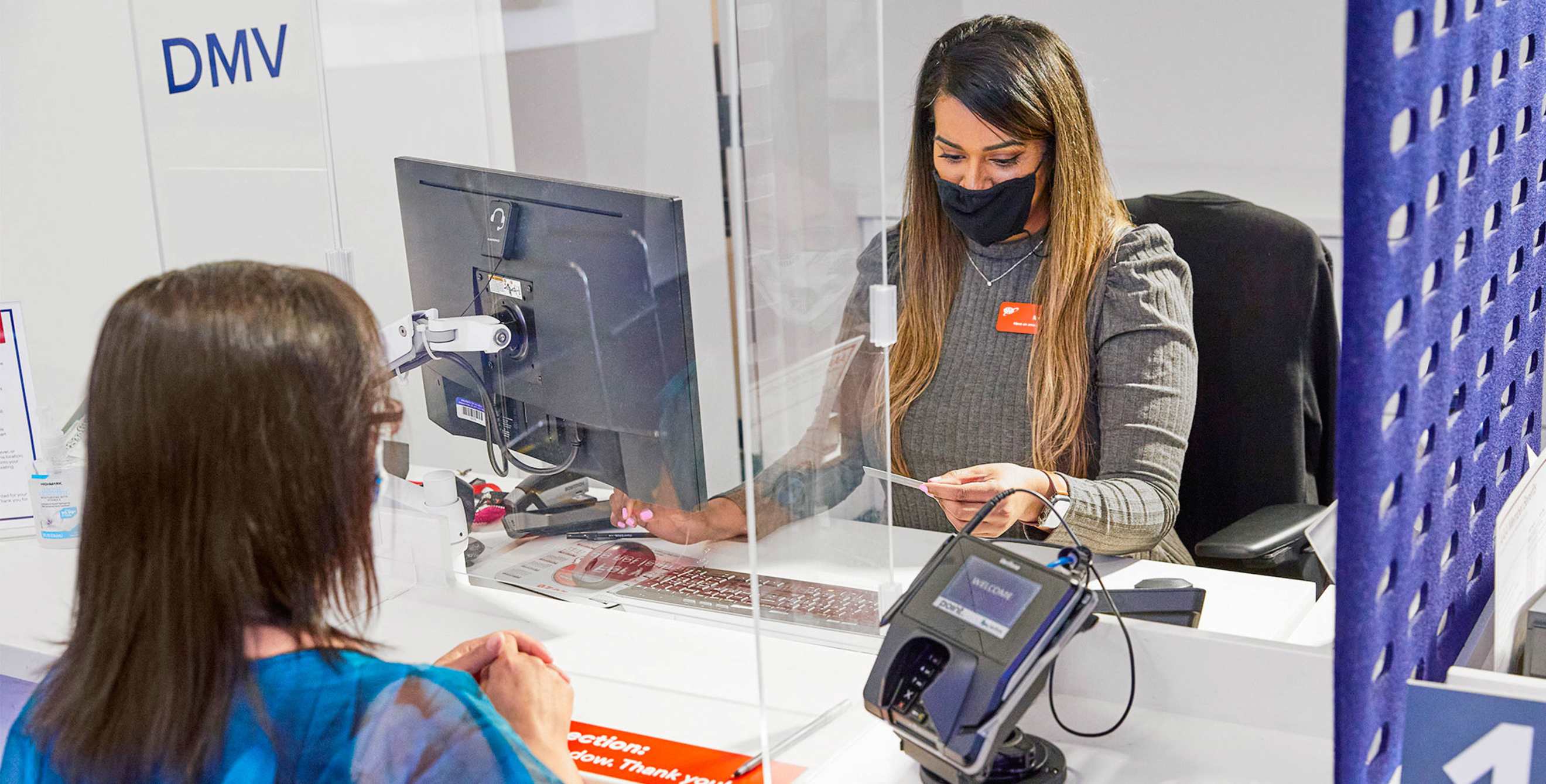 AAA Member completes DMV transaction at a AAA Branch.