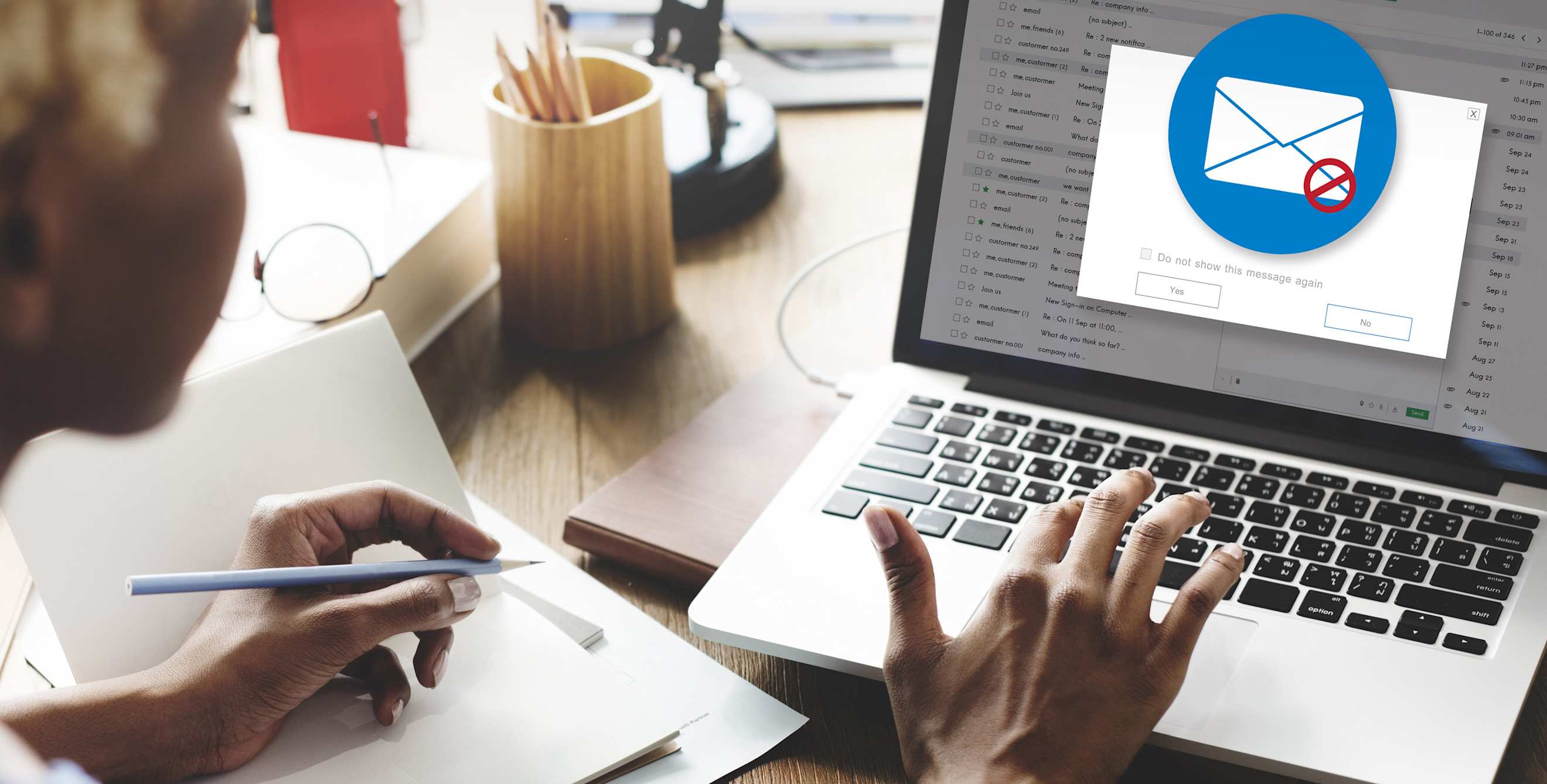 A person clears phishing emails out of their inbox.