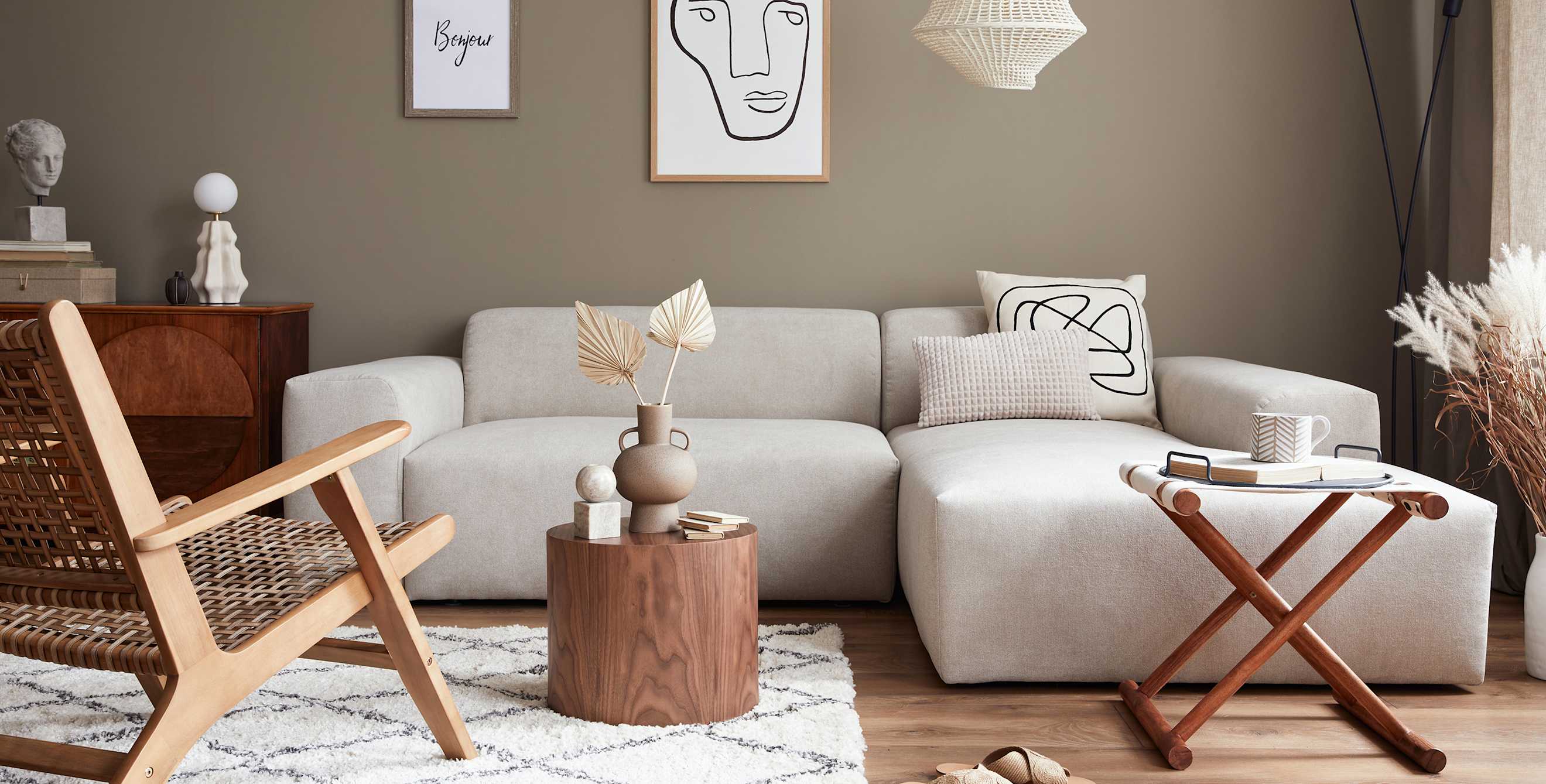 A comfy couch with comtemporary secondhand furniture.