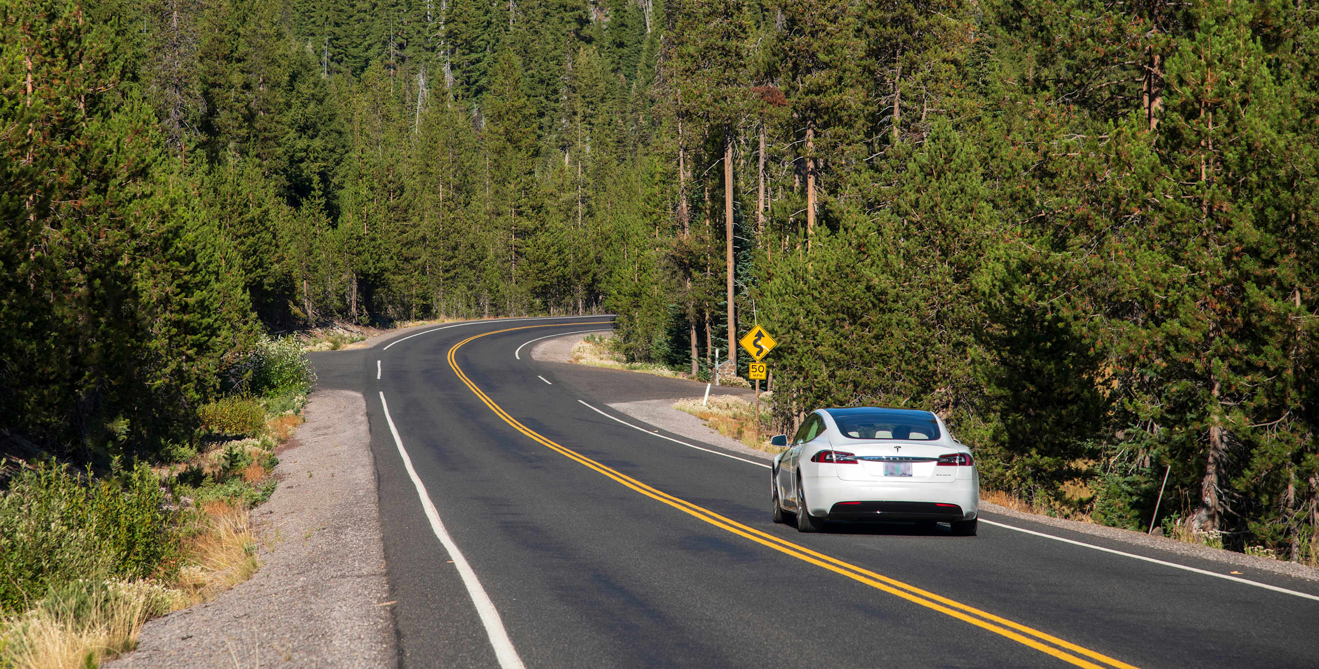 A Tesla on a highway outside of Bend, Oregon.