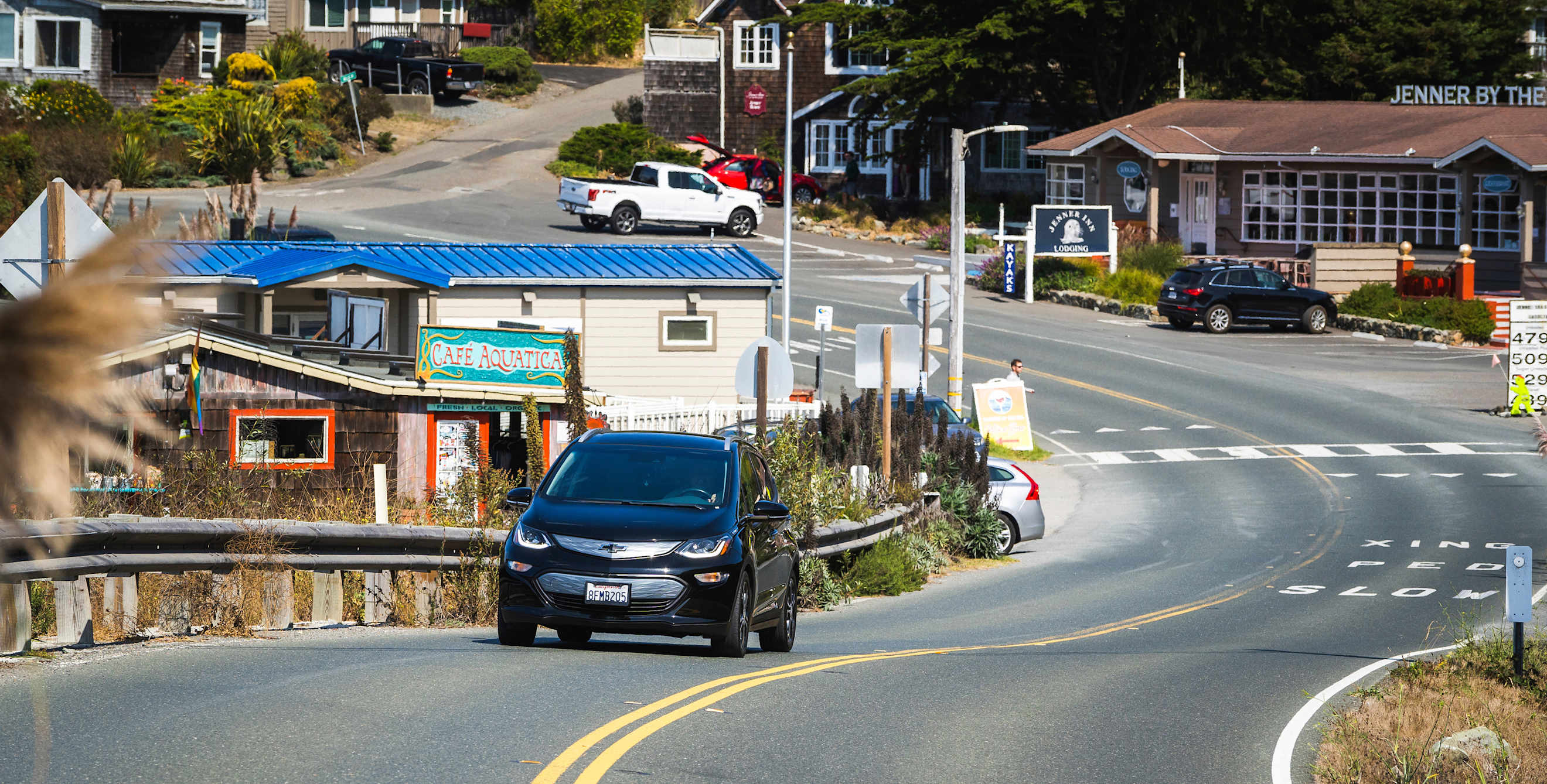 A Chevy Bolt drives through Jenner, California.